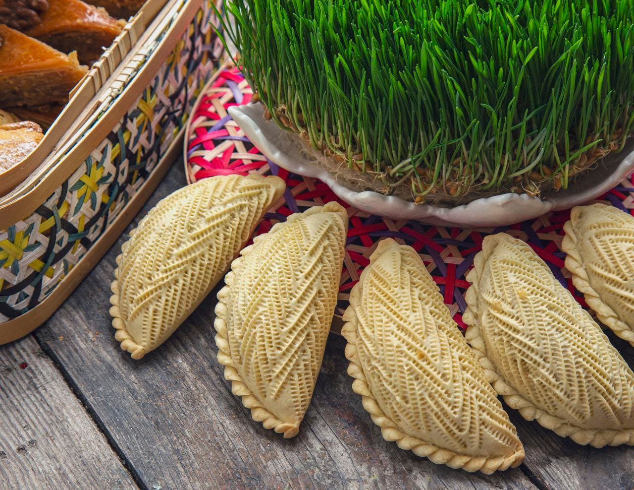 Shekerbura — a azerbaijani dessert dish from Azerbaijan — featuring half-moon shaped, nut-filled, Novruz essential