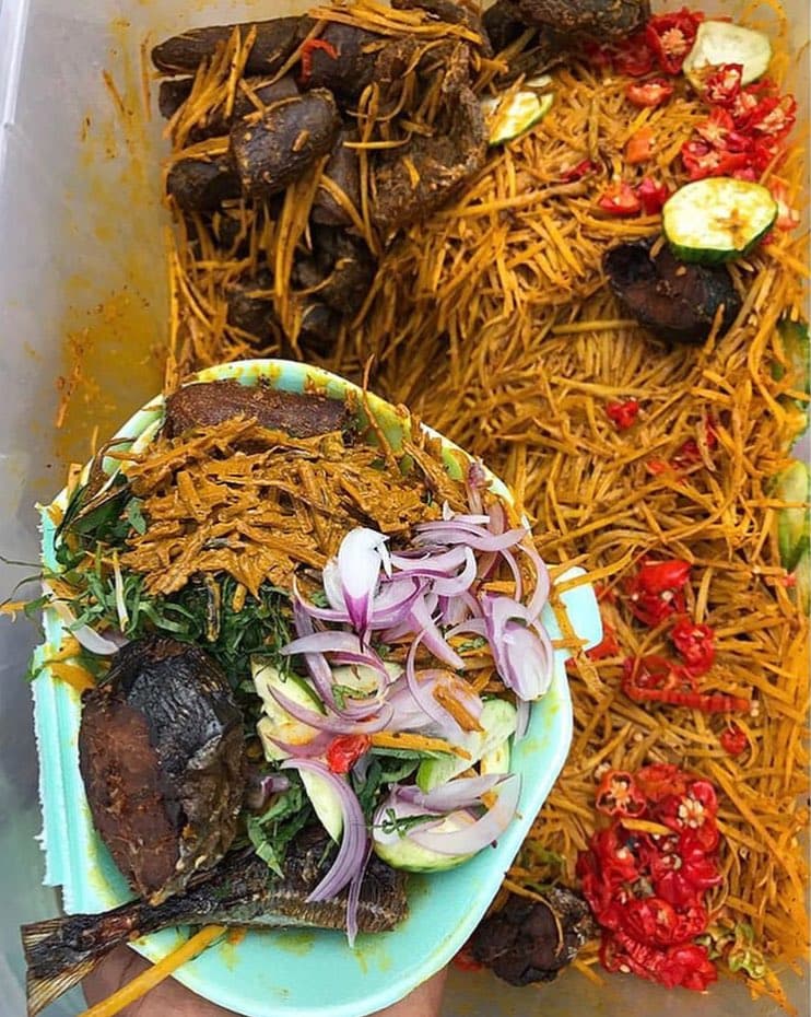 Abacha (food) — a nigerian snack dish from Nigeria — featuring cassava-based, soaked & softened, palm oil-curdled