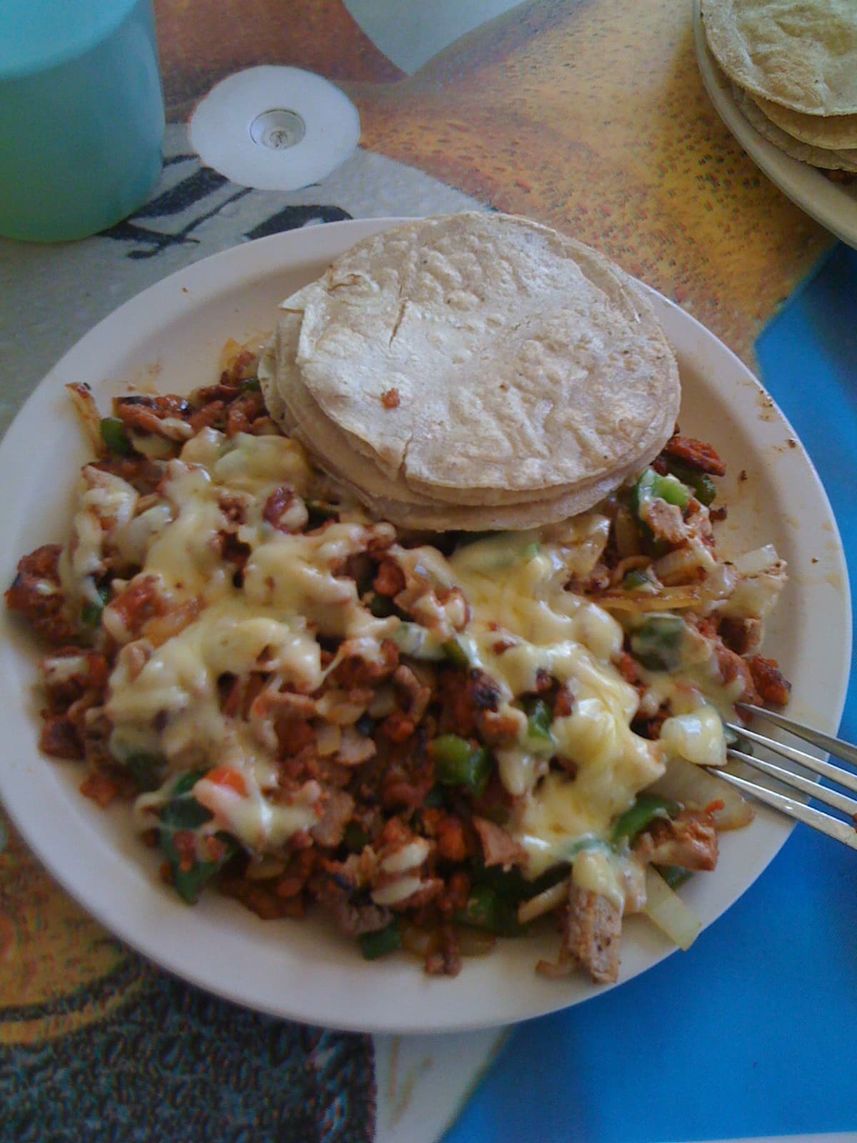 Alambre — a mexican main course dish from Mexico — featuring grilled and stacked, customizable protein, fresh vegetable medley