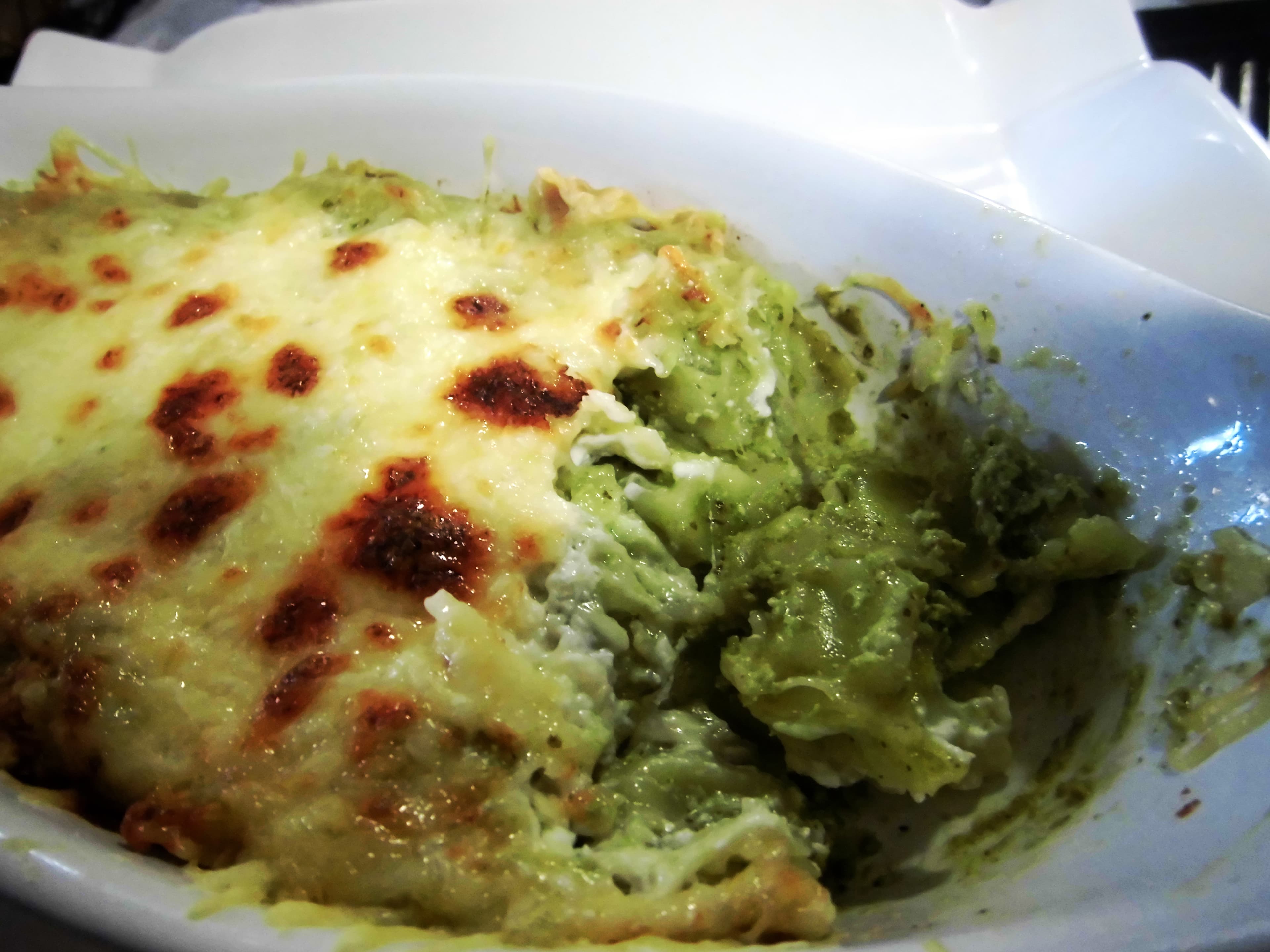 Raviole du Dauphiné — a french main course dish from France — featuring tiny, cheese-filled, butter-enriched
