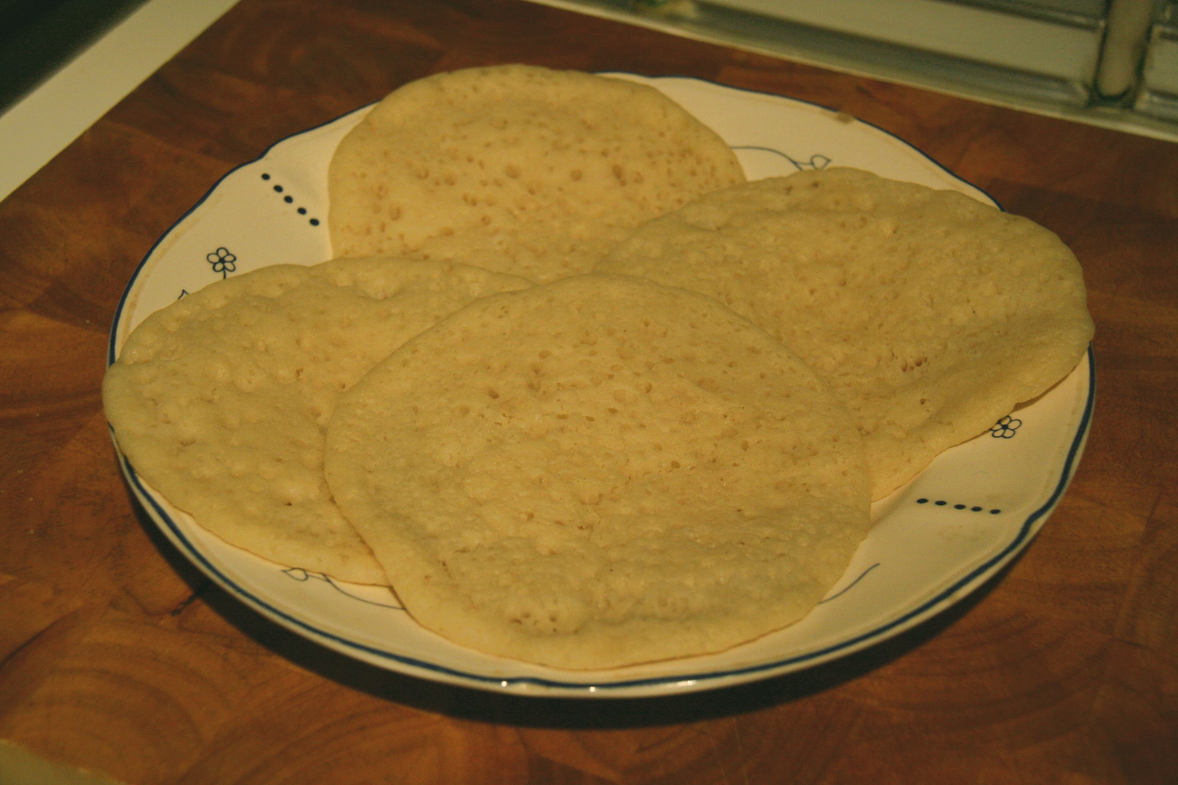 Baghrir — a algerian breakfast dish from Algeria — featuring spongy-textured, hole-riddled, semolina-based