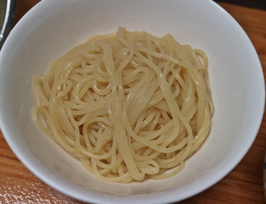 Jjolmyeon — a korean main course dish from South Korea — featuring chewy texture, cold and spicy, hand-mixed