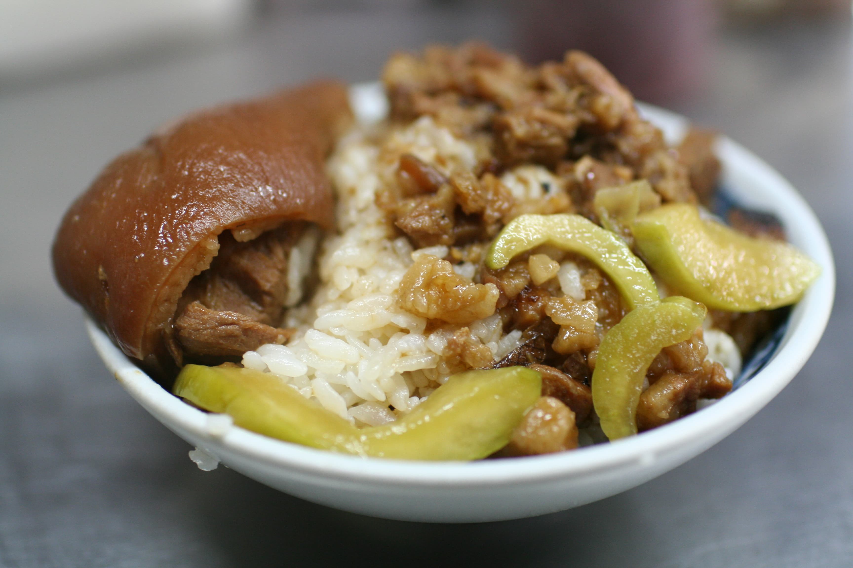 Braised pork rice — a taiwanese main course dish from Taiwan — featuring braised pork belly, soy-marinated, gaifan