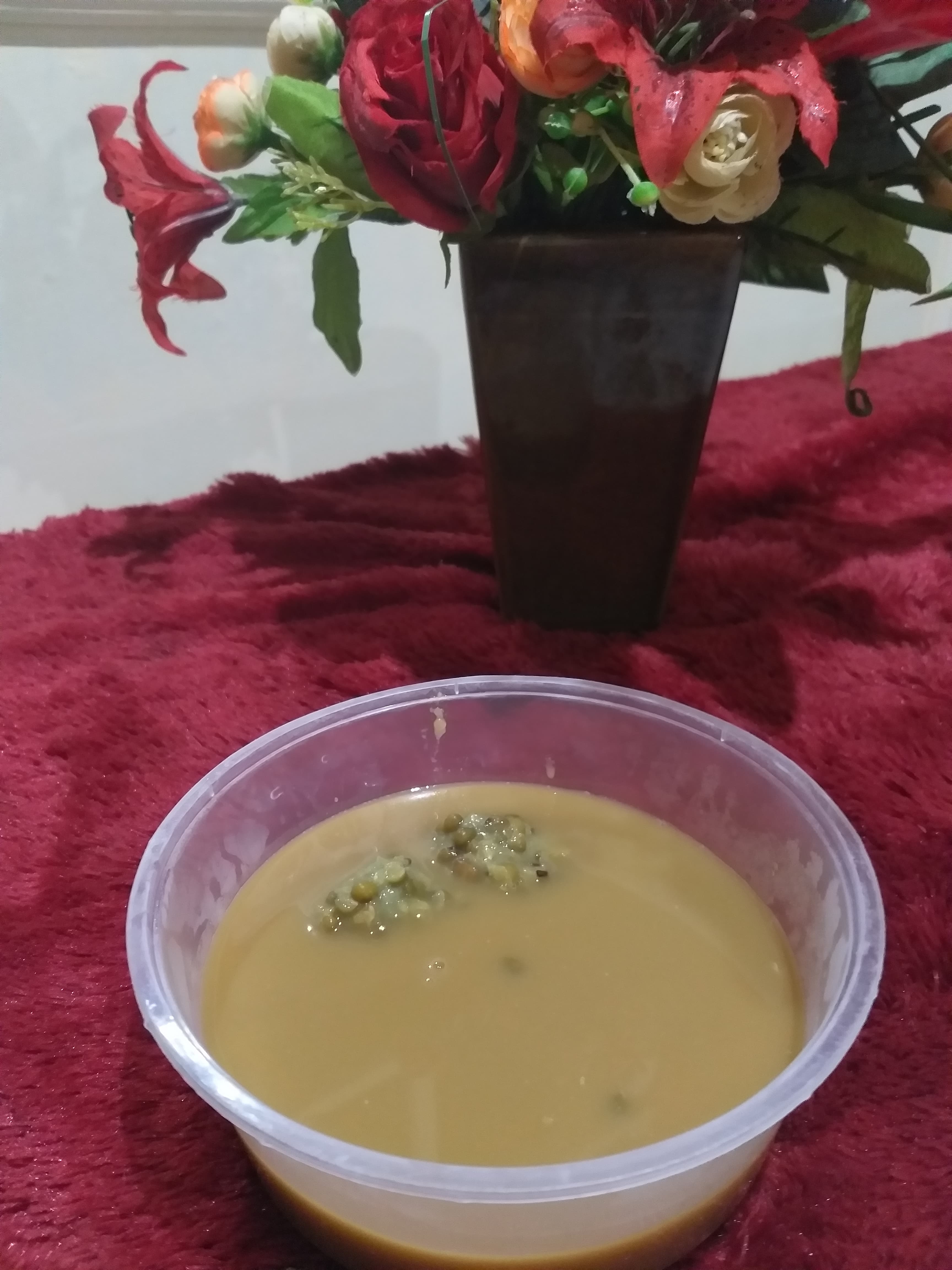 Bubur kacang hijau — a indonesian dessert dish from Indonesia — featuring boiled-until-soft, coconut-milk-rich, palm-sugar-sweetened