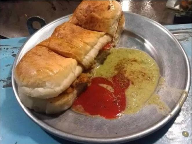 Bun kebab — a pakistani street food dish from Pakistan — featuring egg-forward, butter-rich, street-vendor classic