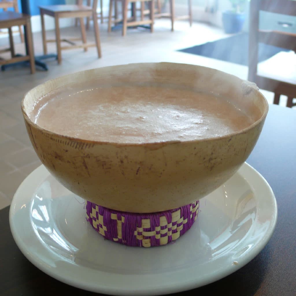 Champurrado — a mexican drink dish from Mexico — featuring corn-forward, hand-whisked, piloncillo-sweetened