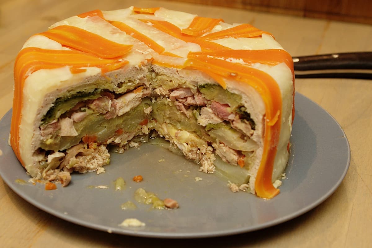 Chartreuse (dish) — a french main course dish from France — featuring vegetable dome, bain-marie cooked, decorative leaf wrapping