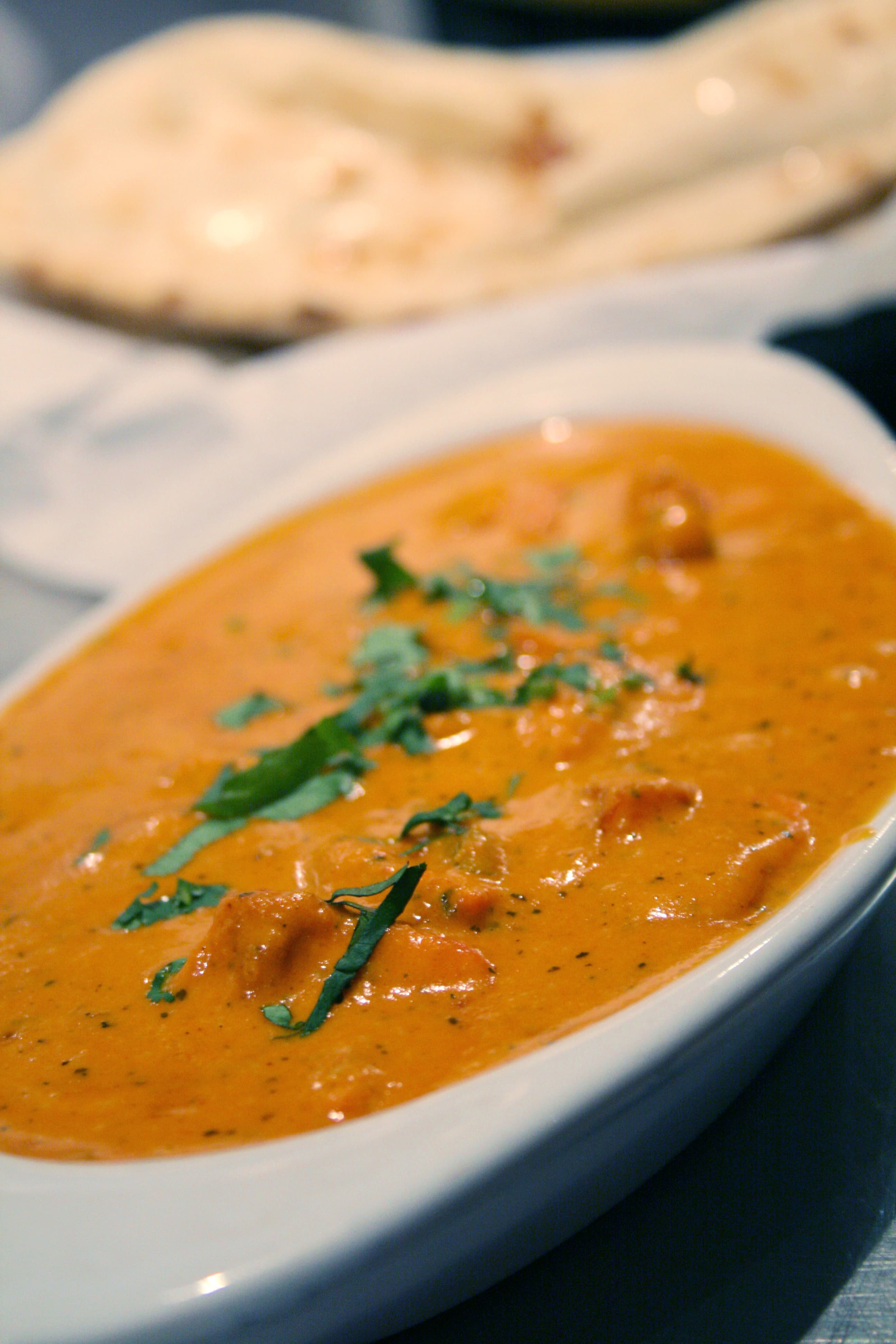 Chicken tikka masala — a indian main course dish from India — featuring marinated & roasted, creamy masala sauce, British-Indian fusion