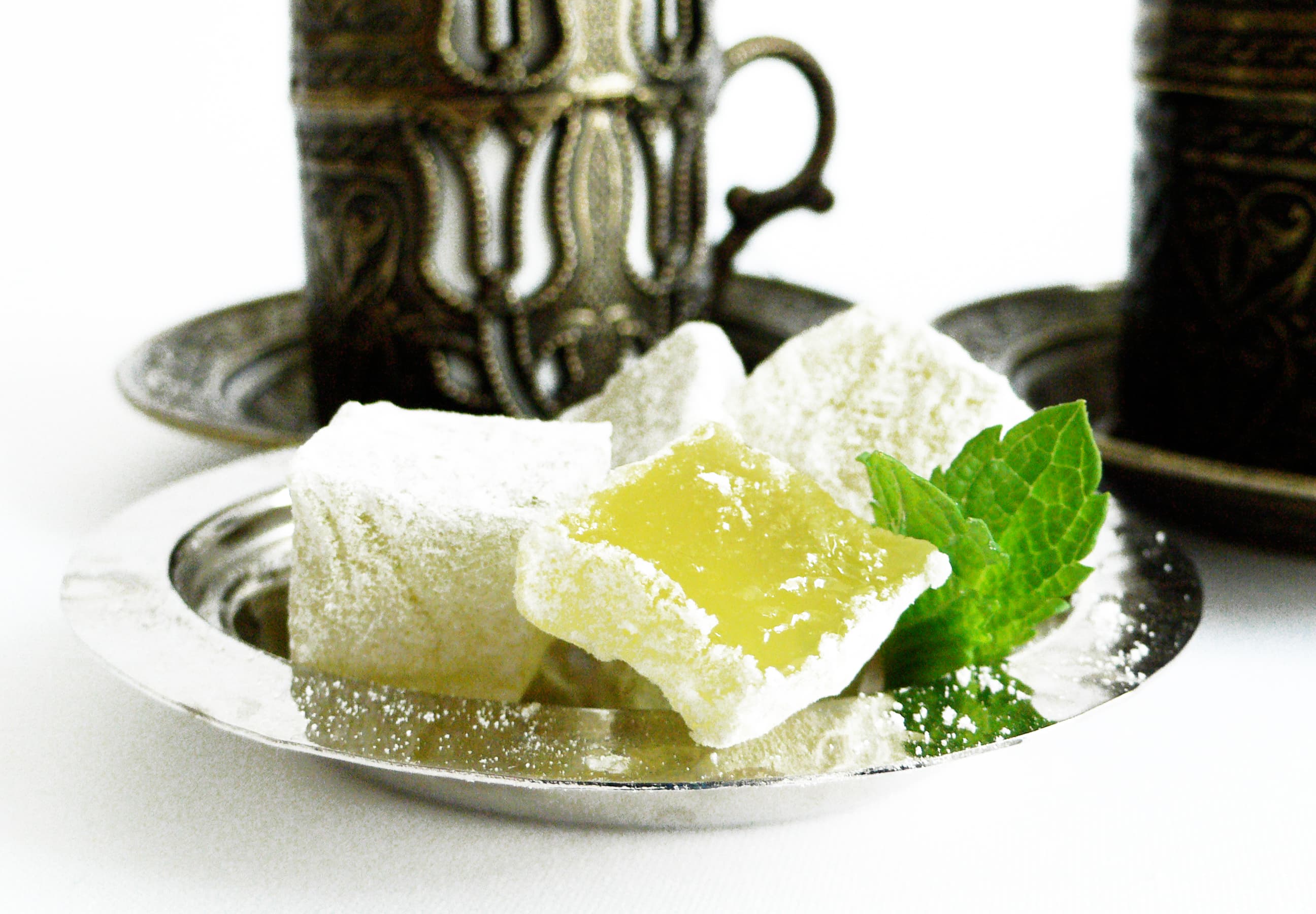 Turkish delight — a ottoman empire cuisine main course dish from Ottoman Empire — featuring gel-based confection, chopped fruit and nut, dusted cubes
