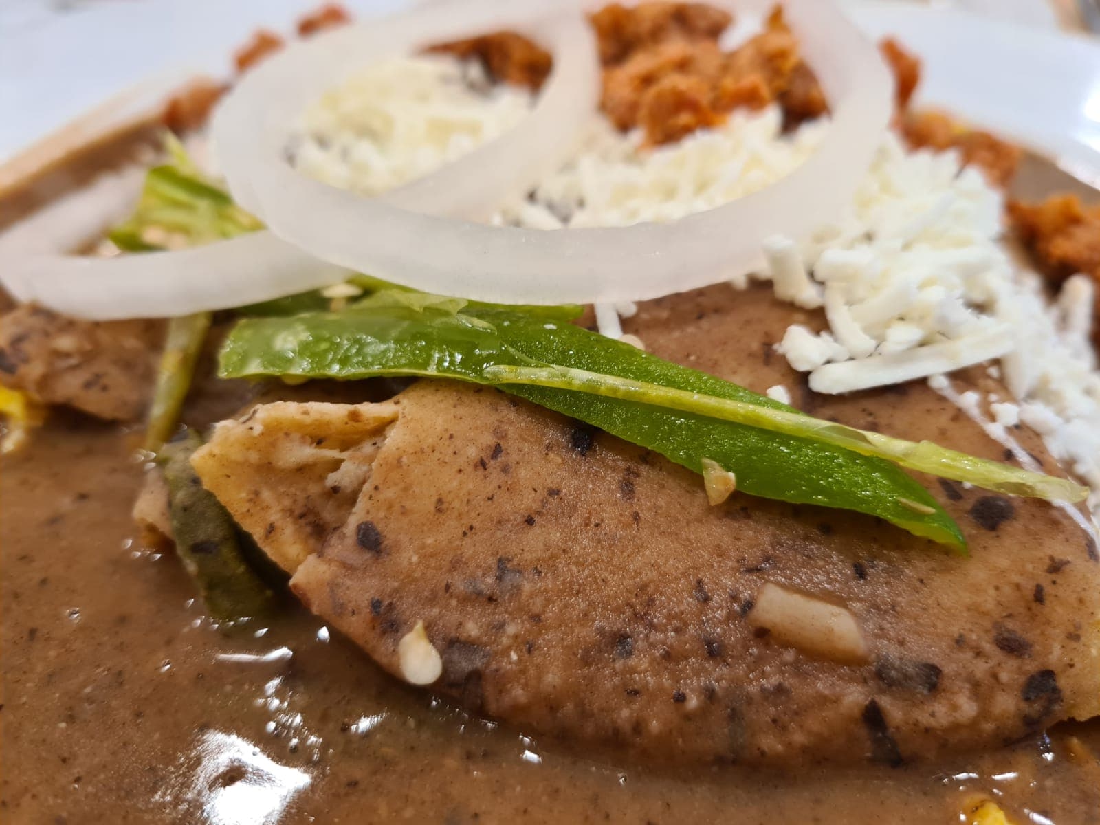 Enfrijoladas — a mexican breakfast dish from Mexico — featuring bean-forward, breakfast dish, regional variation