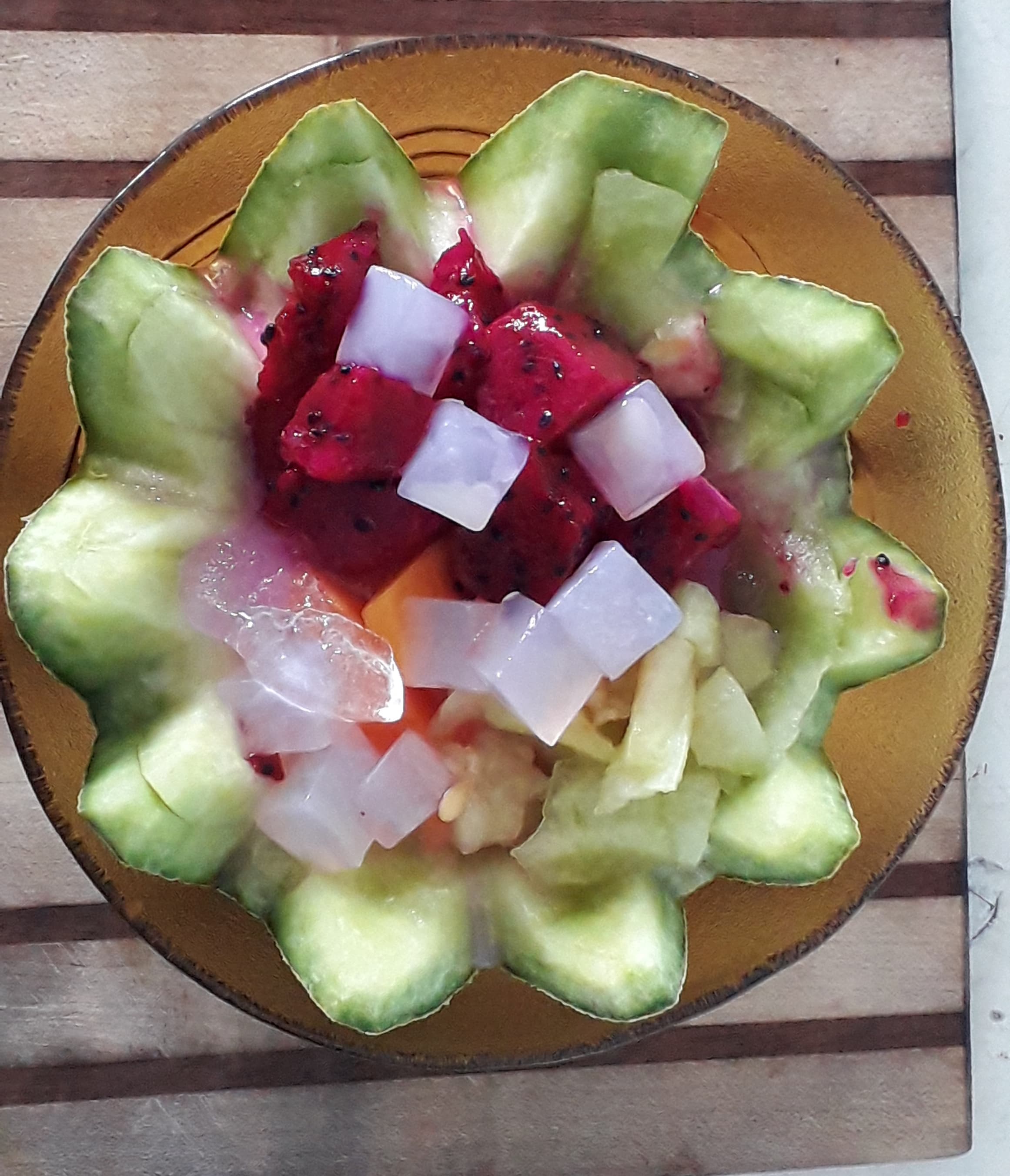 Es buah — a indonesian dessert dish from Indonesia — featuring iced fruit cocktail, variable ingredients, syrup-sweetened