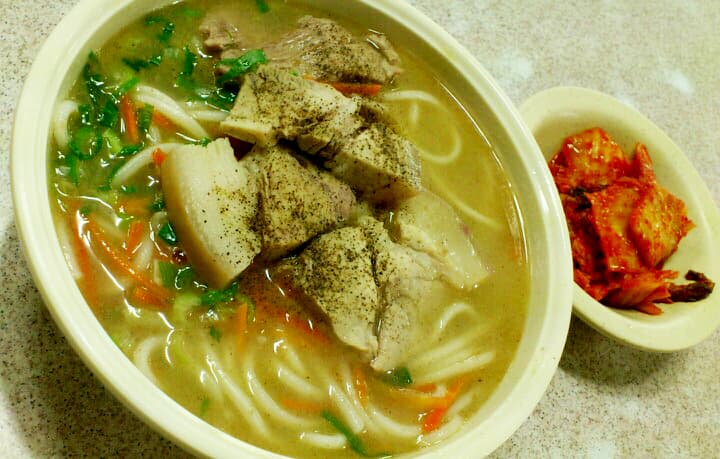 Gogi-guksu — a korean main course dish from South Korea — featuring pork-based broth, light and clean, variable noodle texture