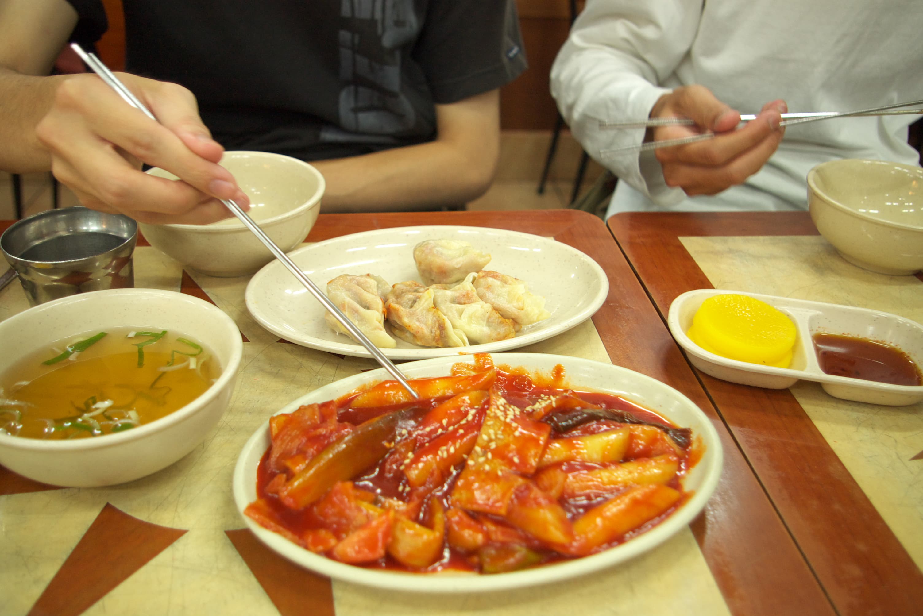 Bunsik — a korea cuisine snack dish from Korea — featuring flour-forward, high-volume plating, fast casual
