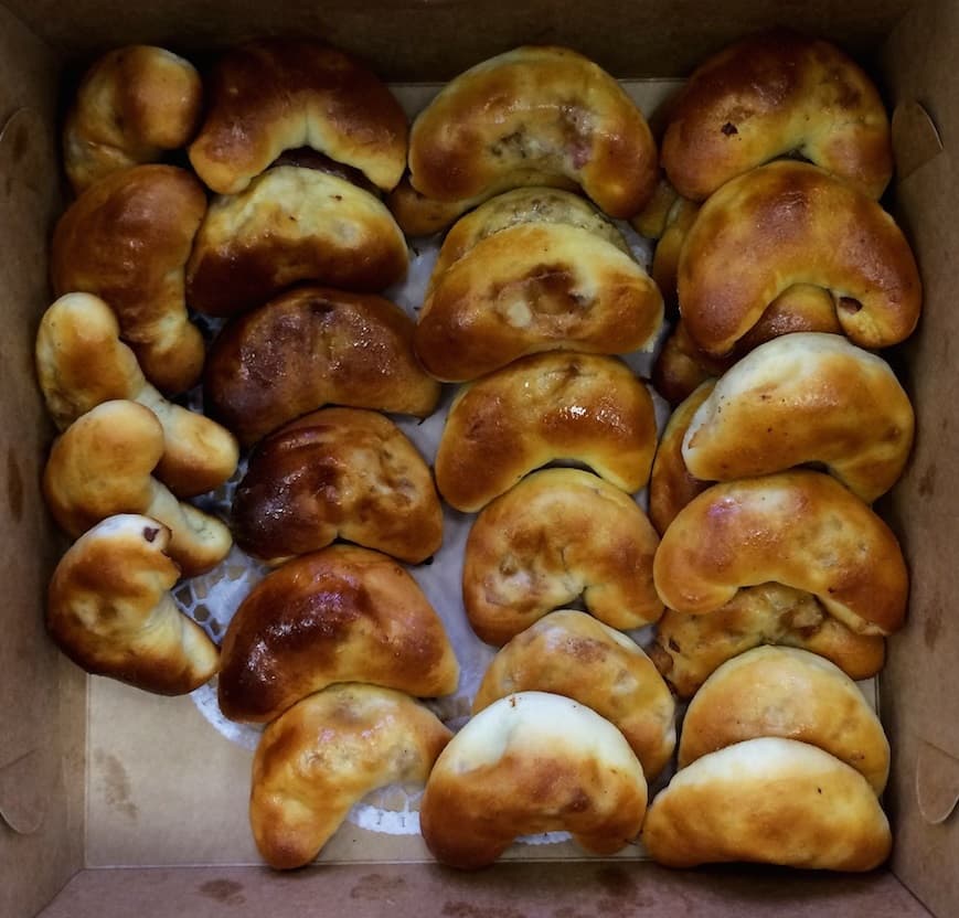 Speķrauši — a latvia cuisine snack dish from Latvia — featuring crescent-shaped, bacon-filled, family-recipe driven