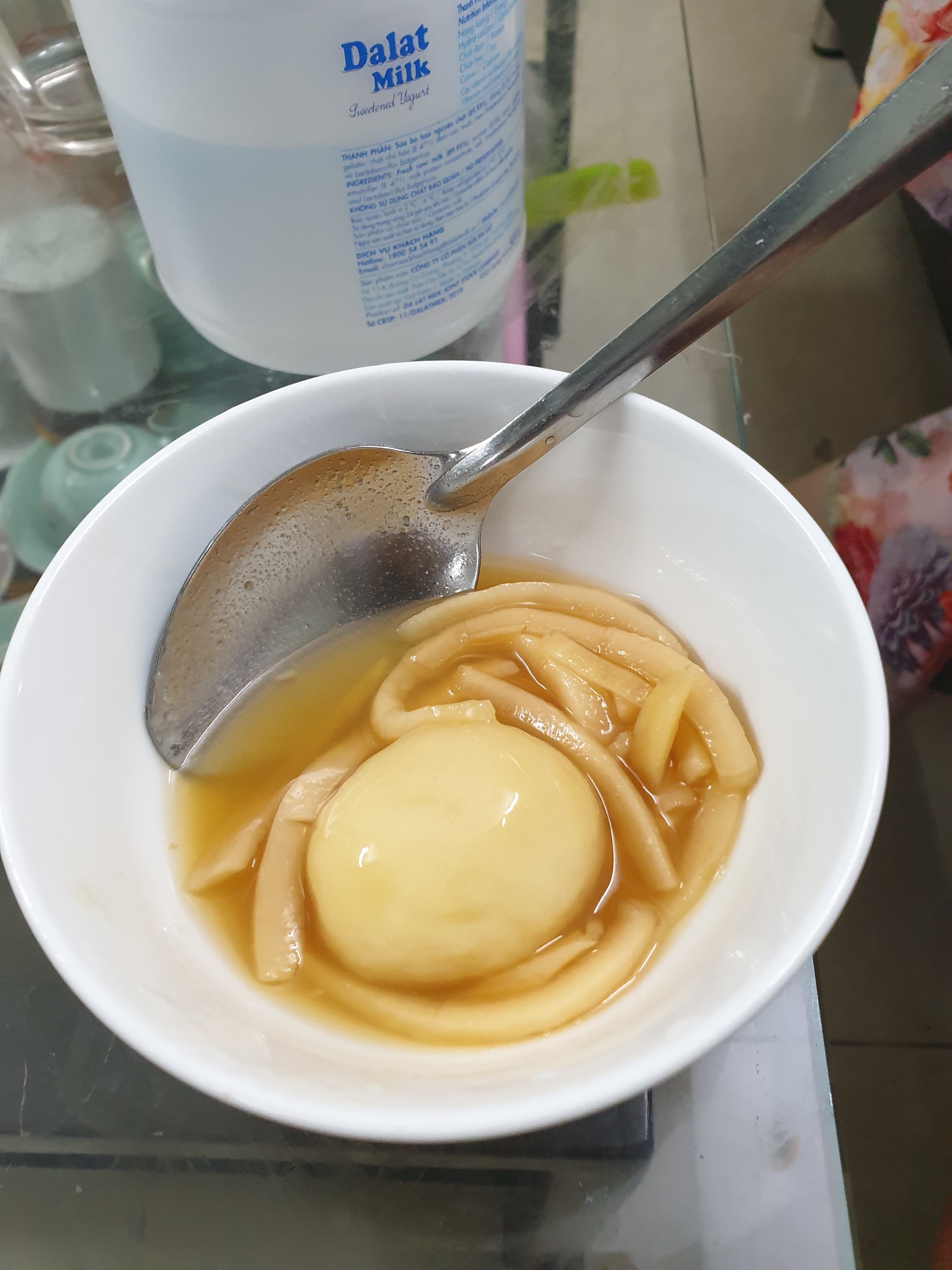 Chè trôi nước — a vietnamese dessert dish from Vietnam — featuring glutinous rice, ginger-sweetened syrup, sesame-topped