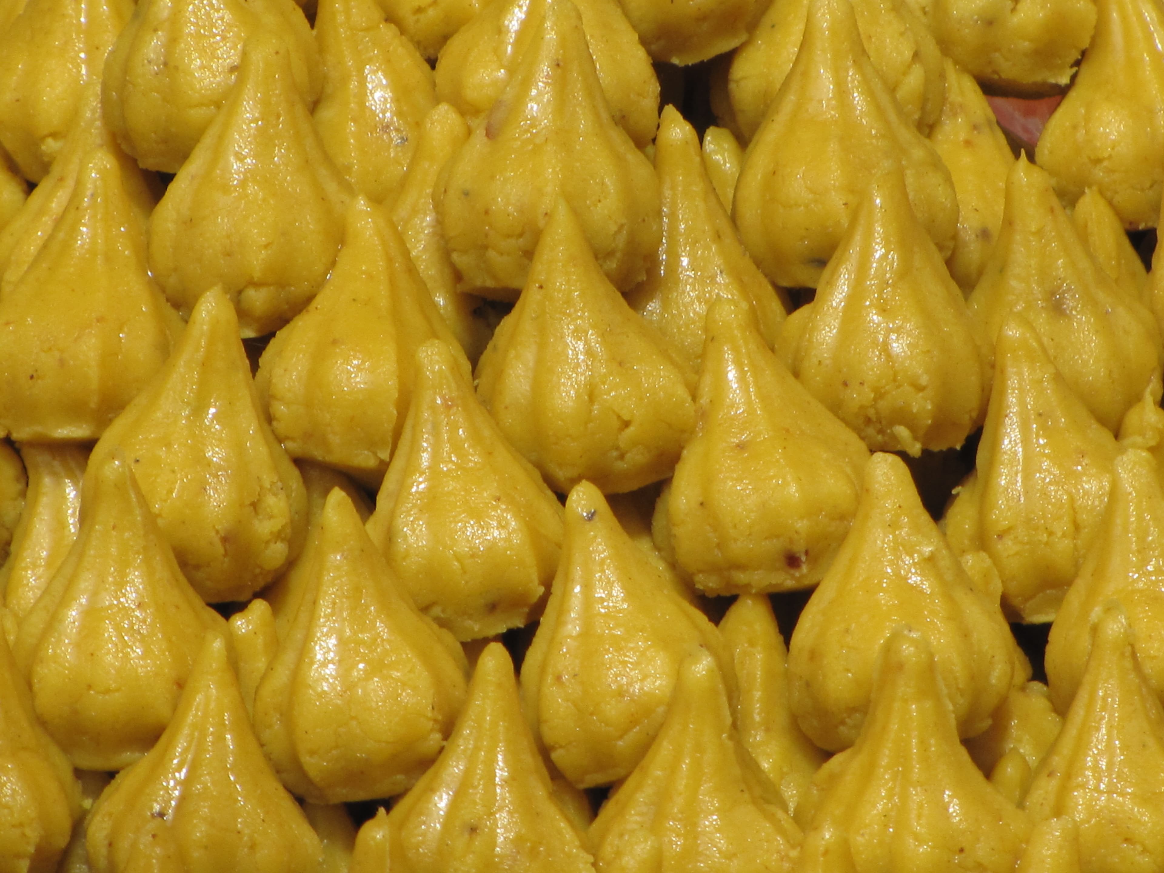 Modak — a indian main course dish from India — featuring steamed or fried, coconut-jaggery filled, devotional sweet