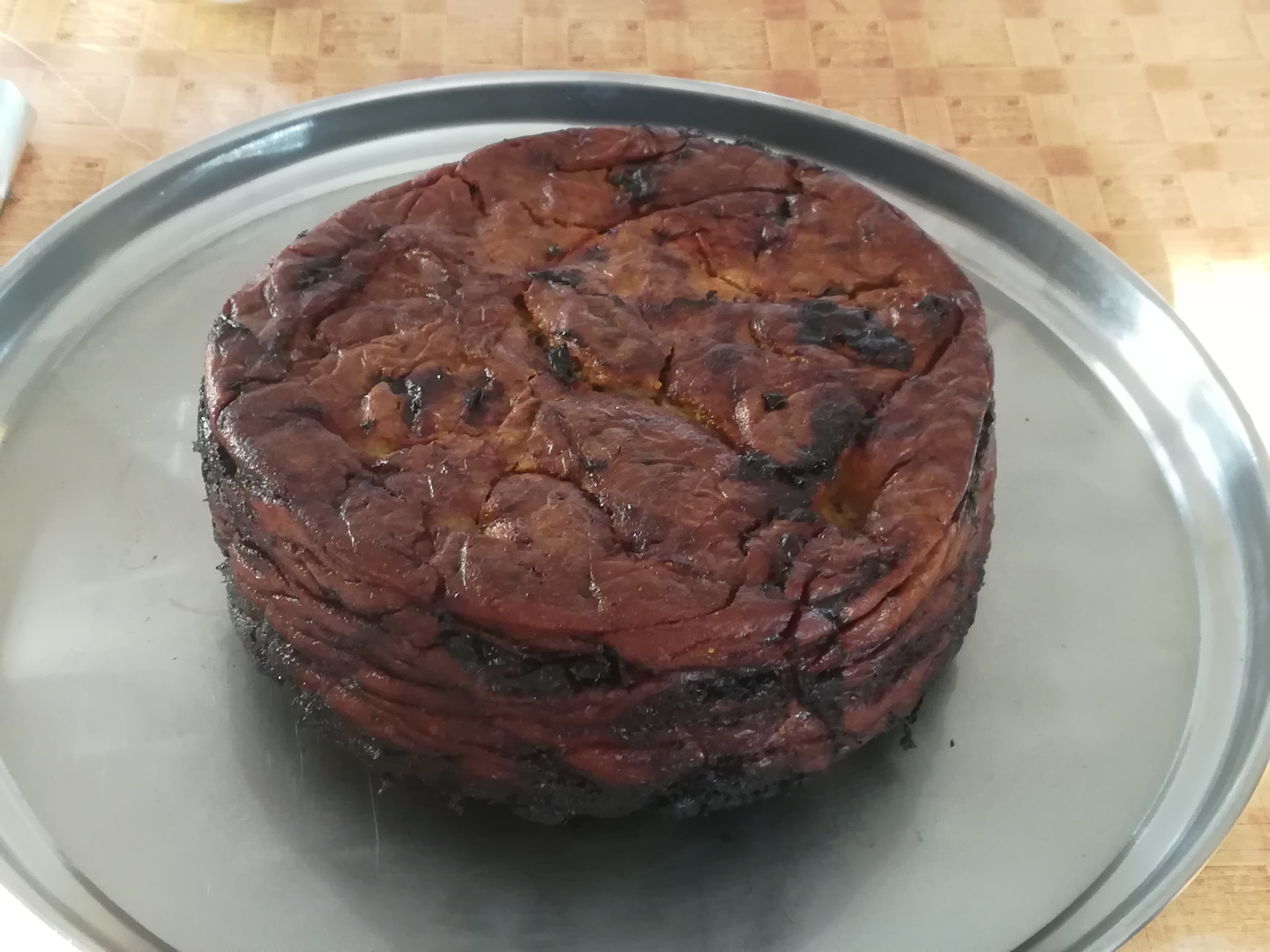 Makmoura — a jordanian main course dish from Jordan — featuring whole wheat base, olive oil-forward, onion-heavy