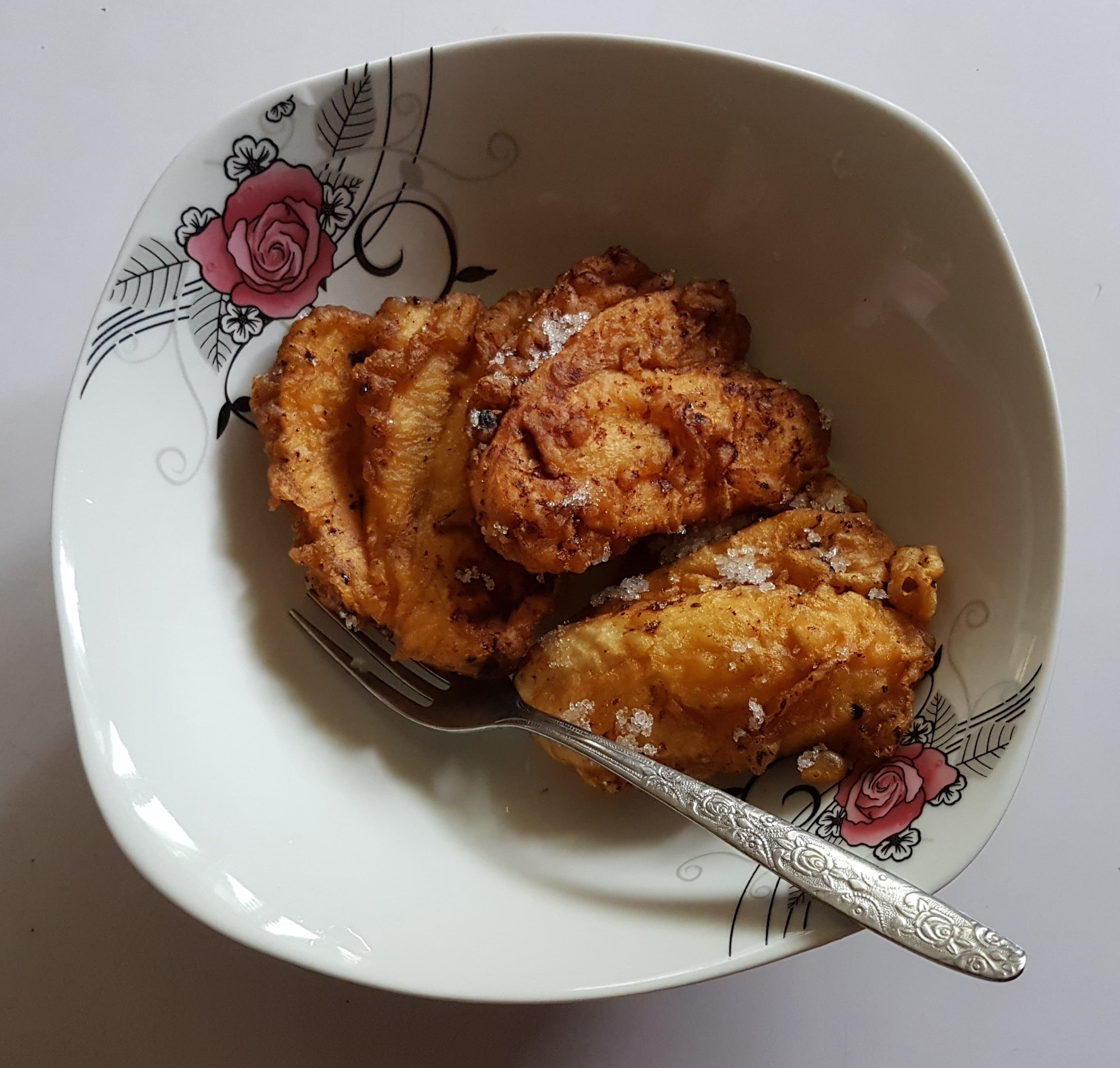 Pinaypay — a filipino street food dish from Philippines — featuring deep-fried, fan-shaped, saba banana