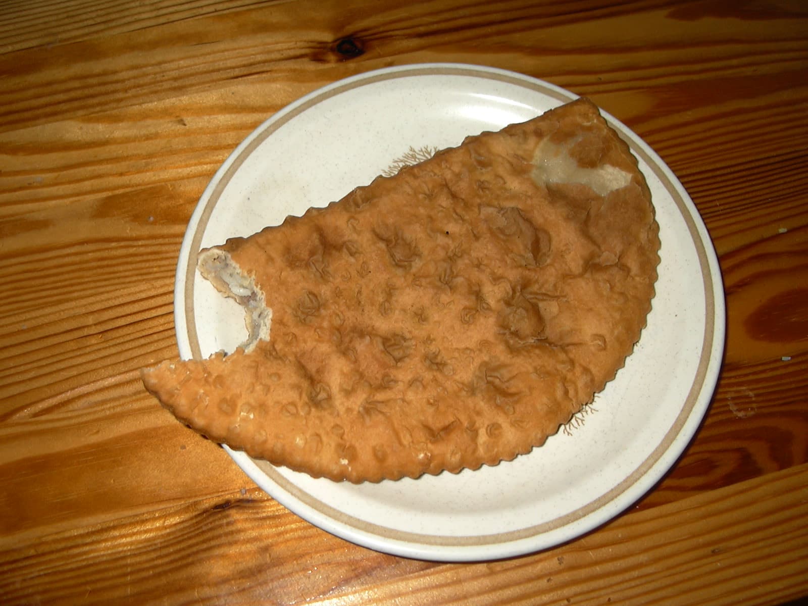 Lörtsy — a finnish main course dish from Finland — featuring half-moon shaped, hand-held, street vendor staple