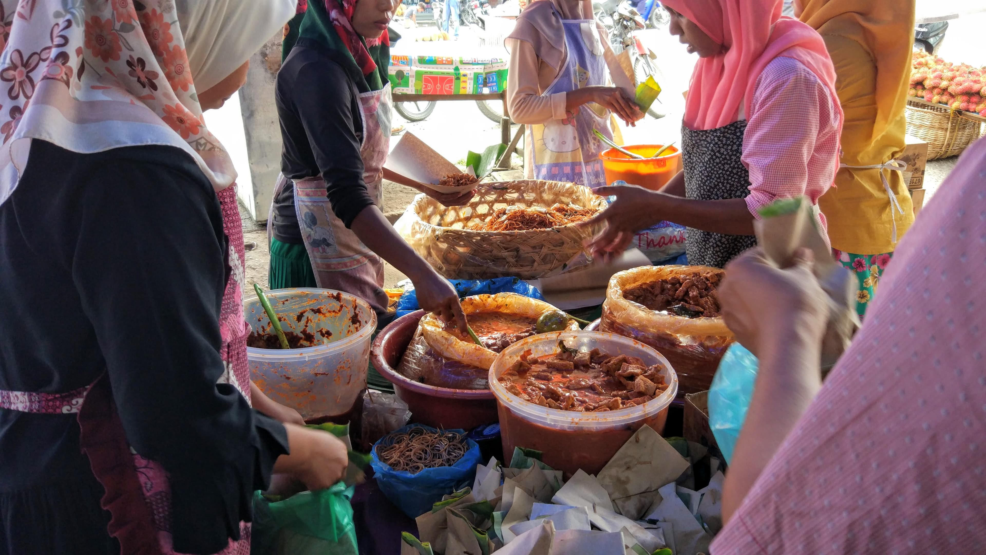 Mie caluk — a indonesian snack dish from Indonesia — featuring coconut-peanut sauce, hand-mixed spices, crunchy krupuk finish