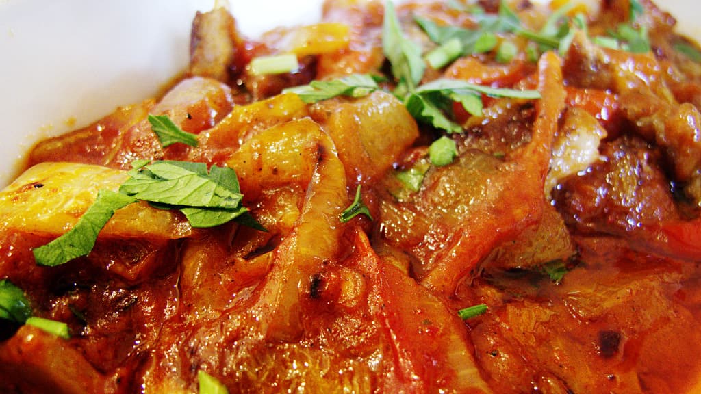 Mućkalica — a serbian main course dish from Serbia — featuring leftover-transformed, mixed-meat stew, regional variations
