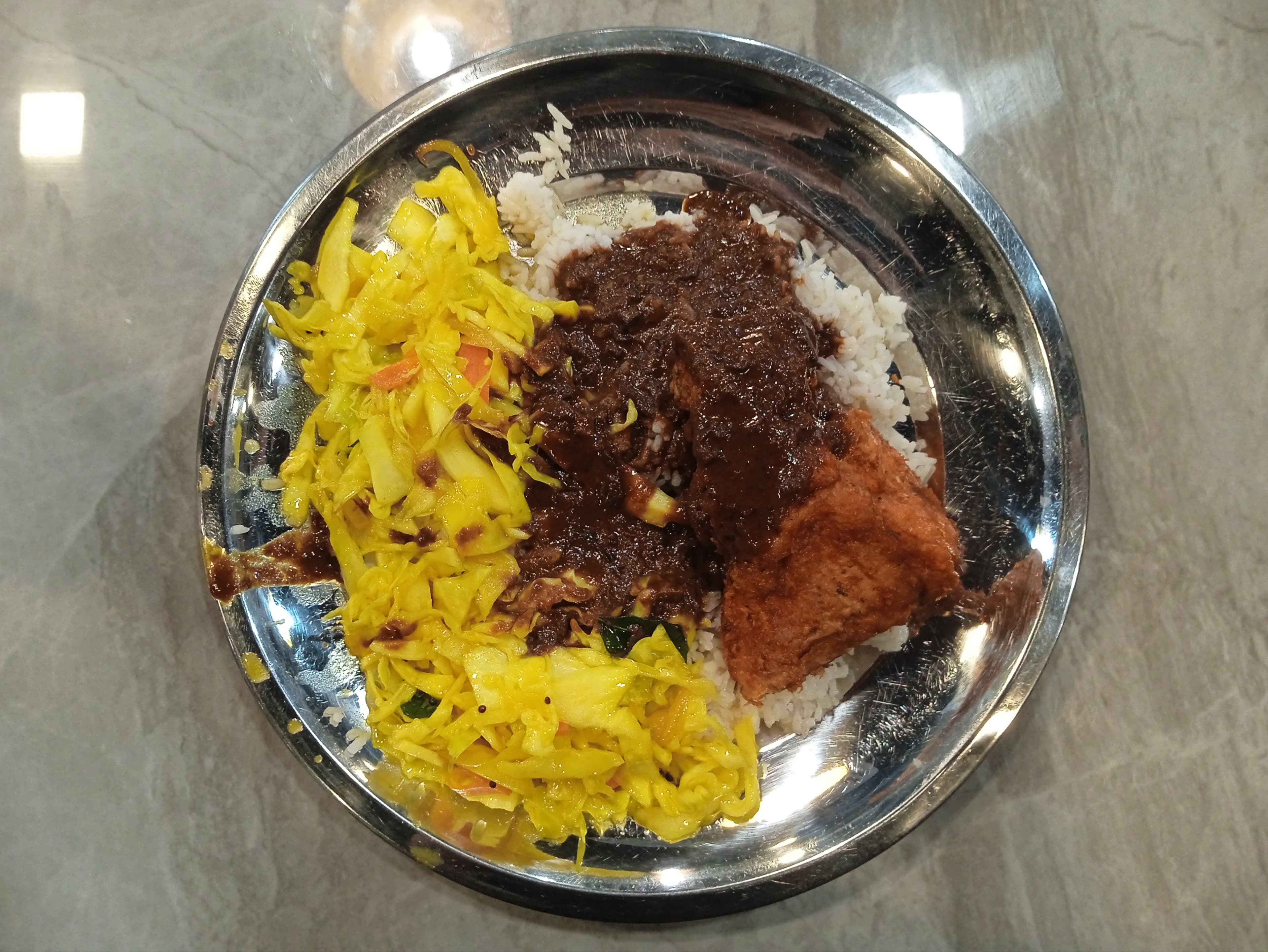 Nasi kandar — a indian main course dish from India — featuring curry-layered, rice-centered, customizable-selection