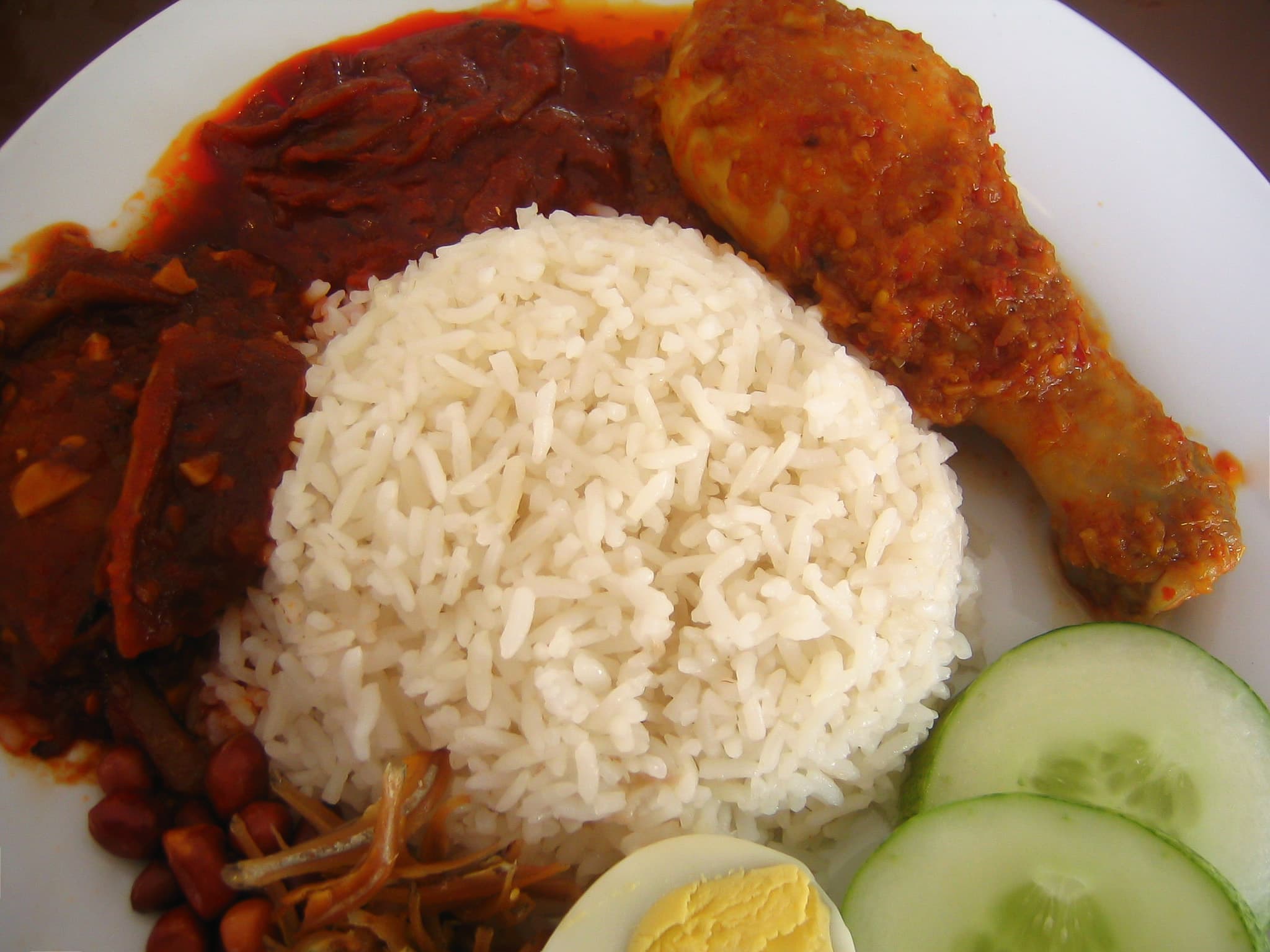 Coconut rice — a indian main course dish from India — featuring coconut milk braised, tropical staple, rice-based