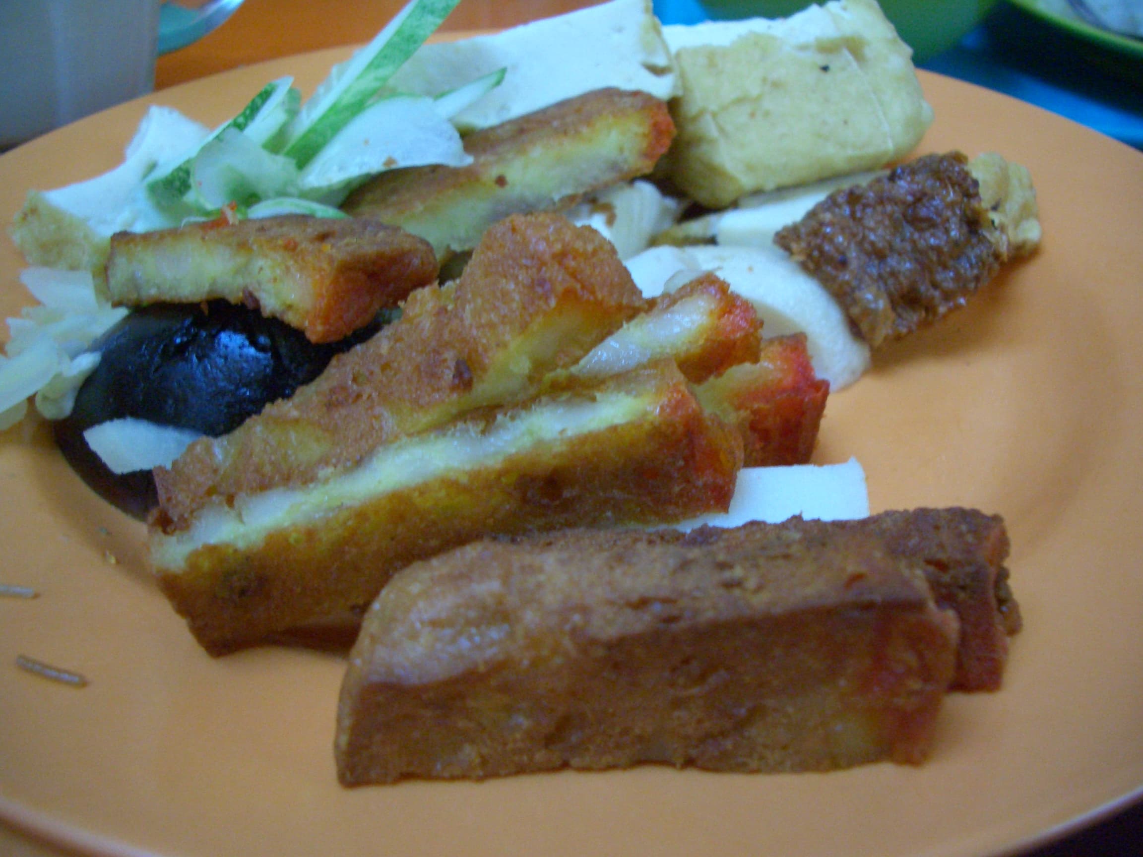 Ngo hiang — a people's republic of china cuisine breakfast dish from People's Republic of China — featuring five-spice seasoned, tofu skin-wrapped, deep-fried