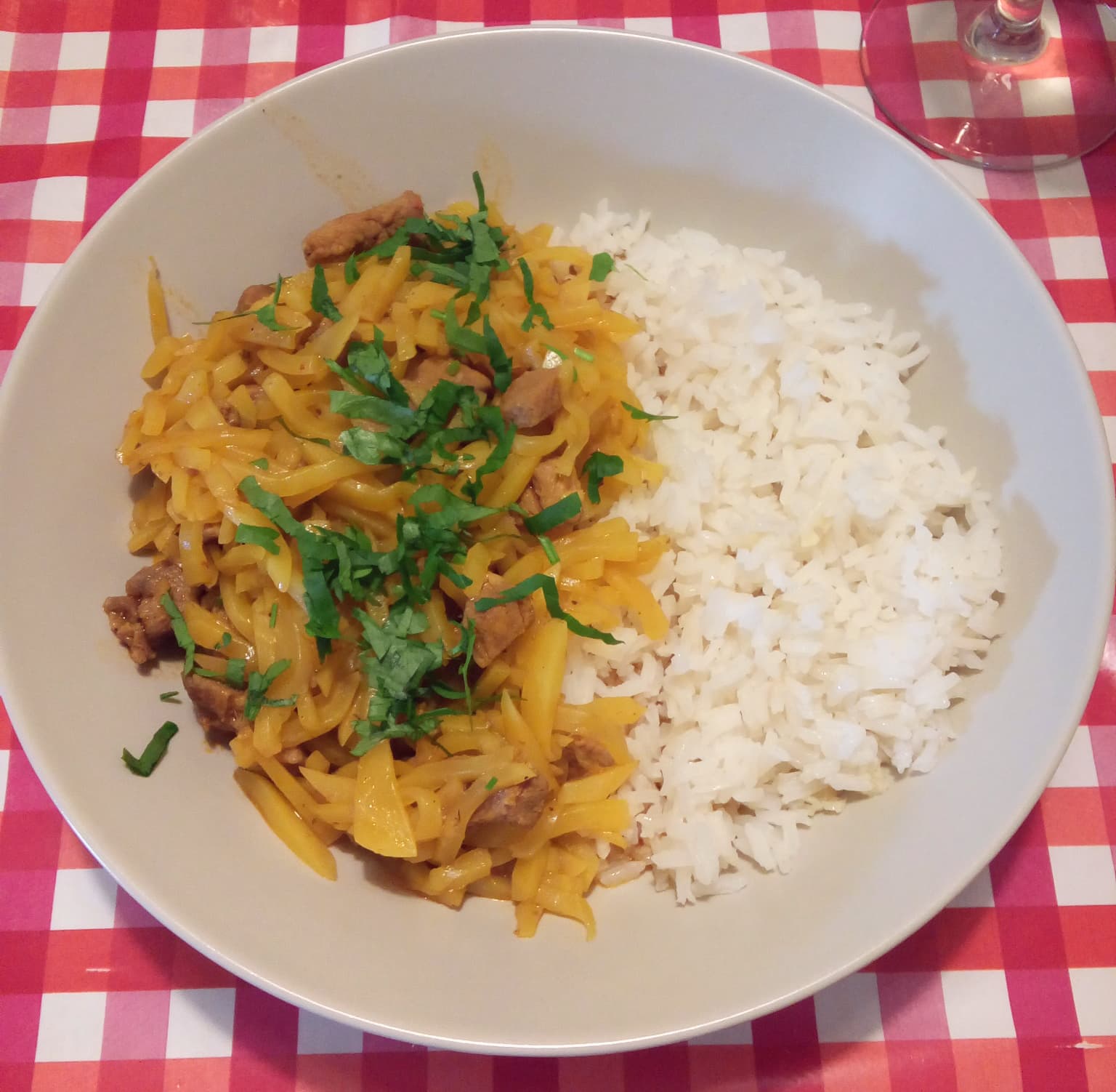 Olluquito — a peruvian main course dish from Peru — featuring stewed root vegetable, dried cured meat, Andean highlands