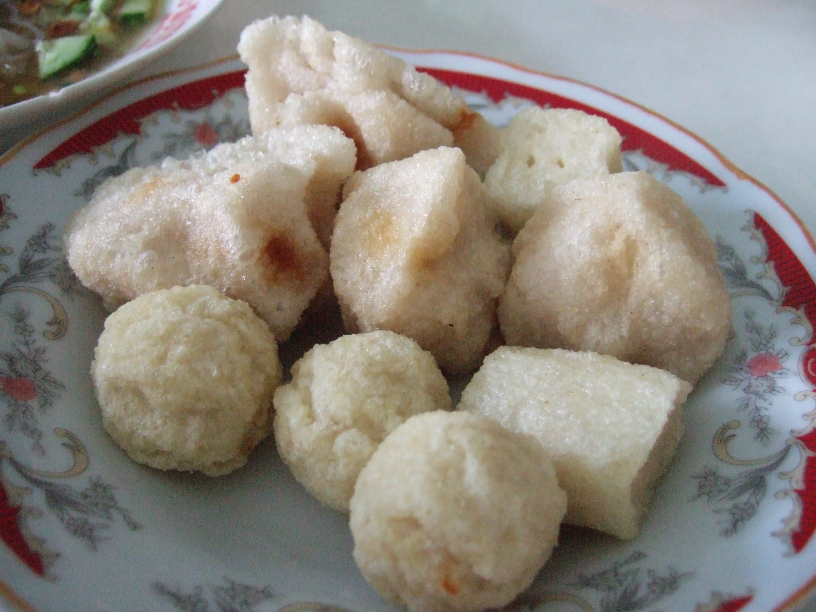 Pempek — a indonesian main course dish from Indonesia — featuring fish-forward, tapioca-bound, vinegar-soaked