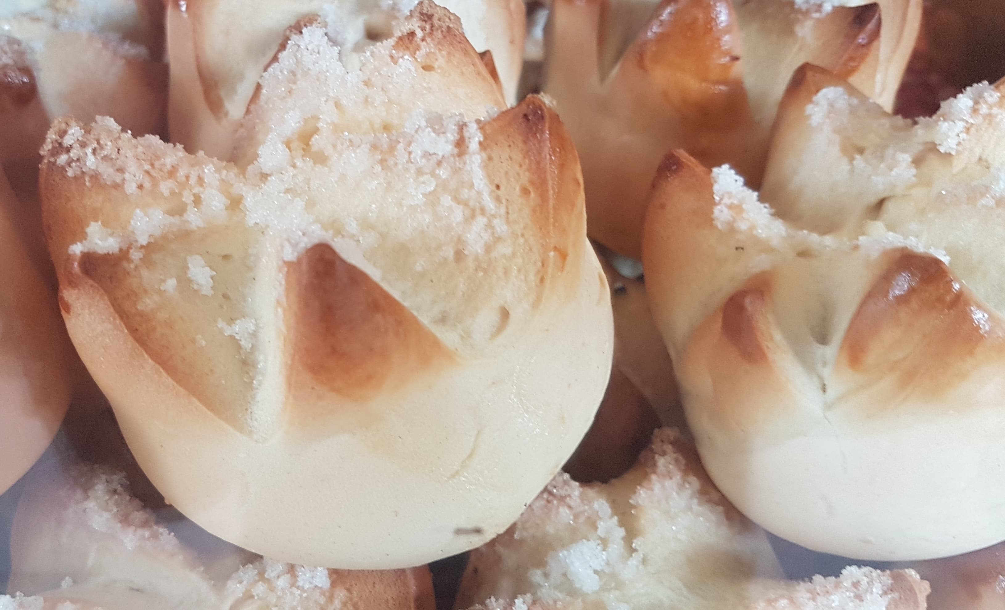 Putok — a filipino main course dish from Philippines — featuring cross-cut baking, dense crumb, sugar-dusted