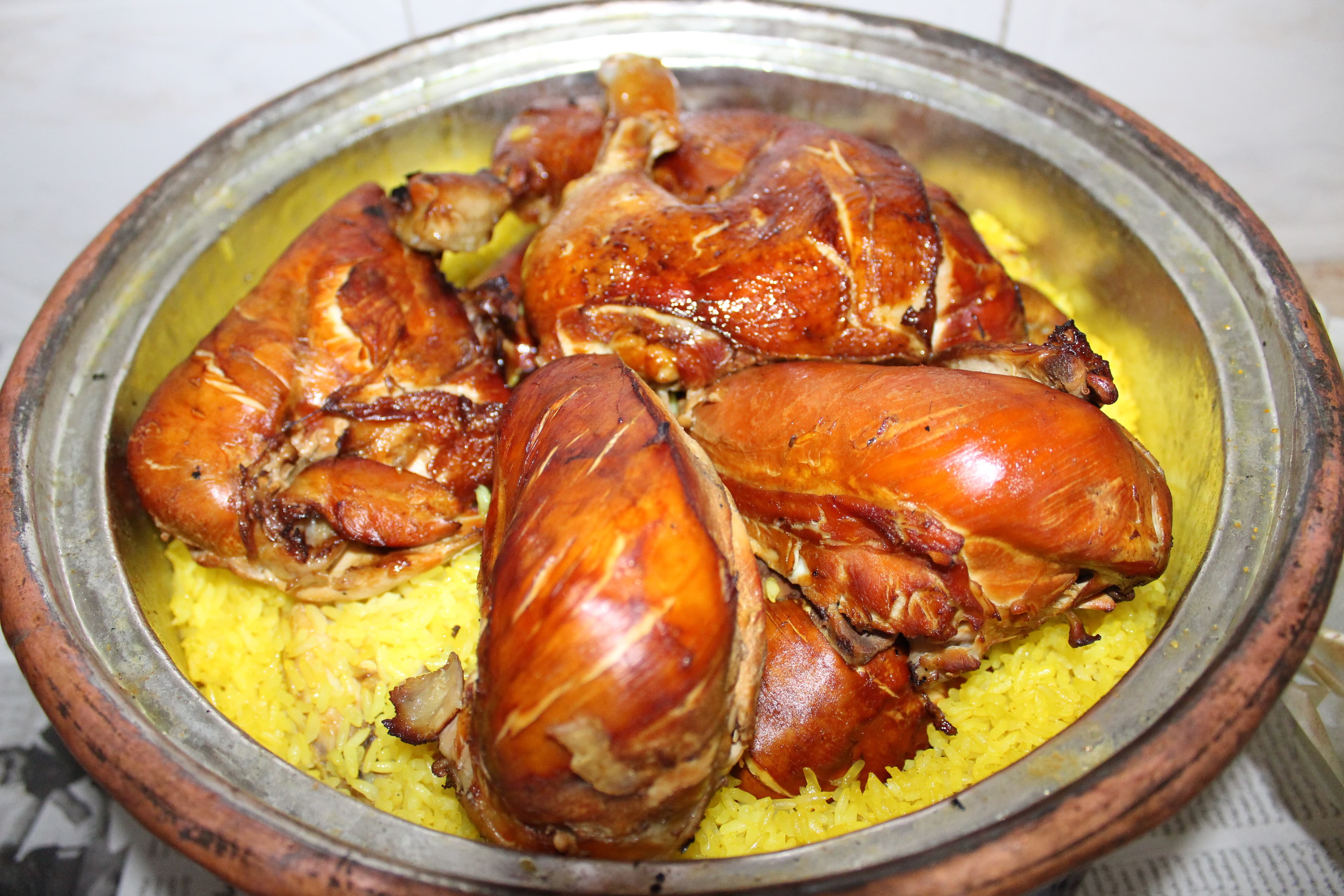Qidreh — a palestinian main course dish from Palestine — featuring clay-oven cooked, feast food, nutted rice
