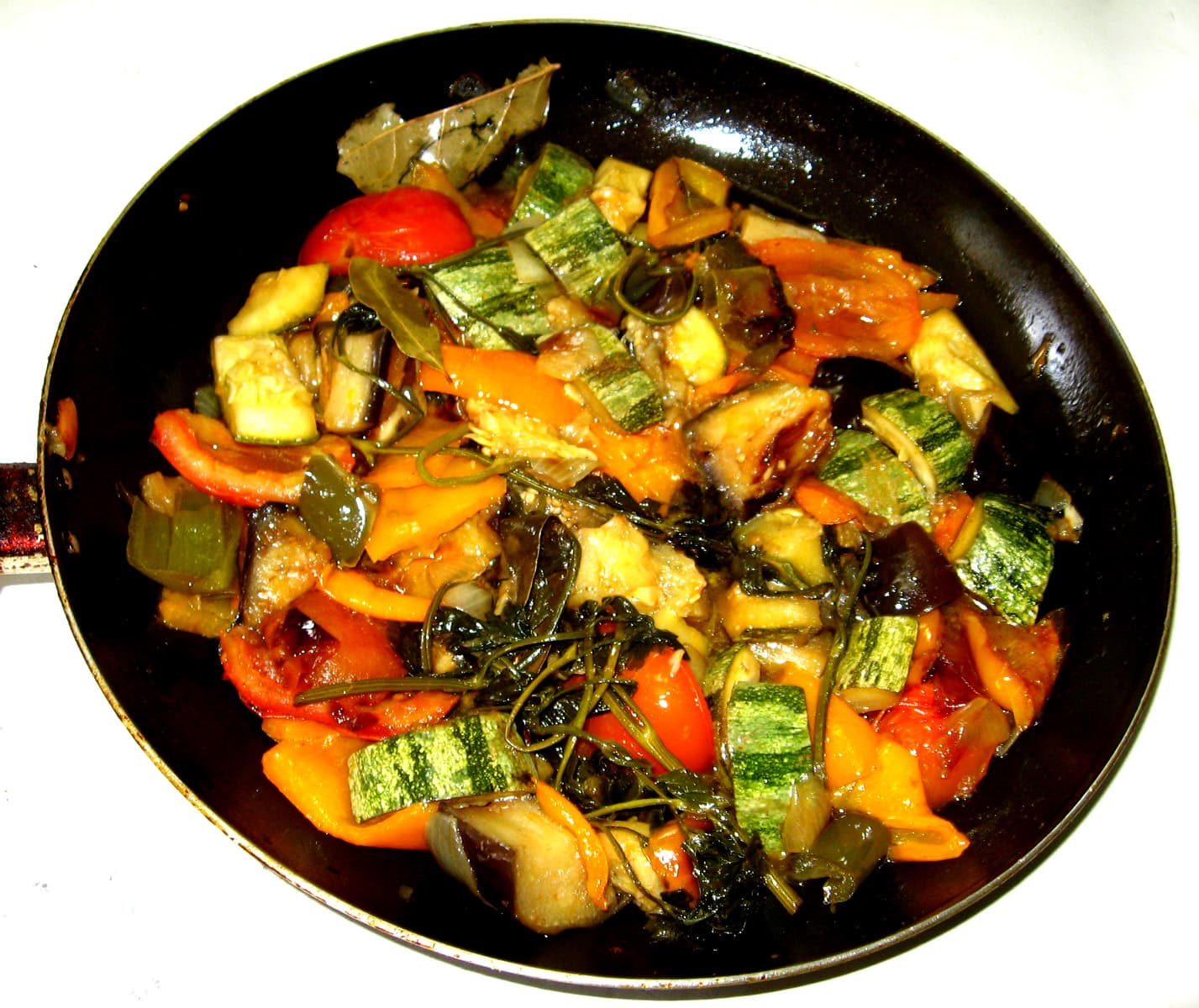Ratatouille — a french main course dish from France — featuring slow-cooked vegetable stew, olive oil base, herb-forward