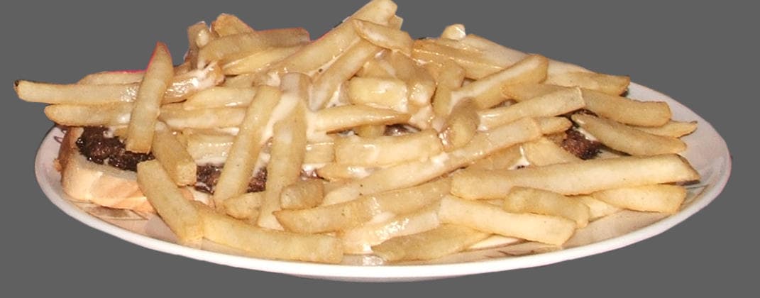 Horseshoe sandwich — a american breakfast dish from United States — featuring open-faced, smothered in sauce, fork-required