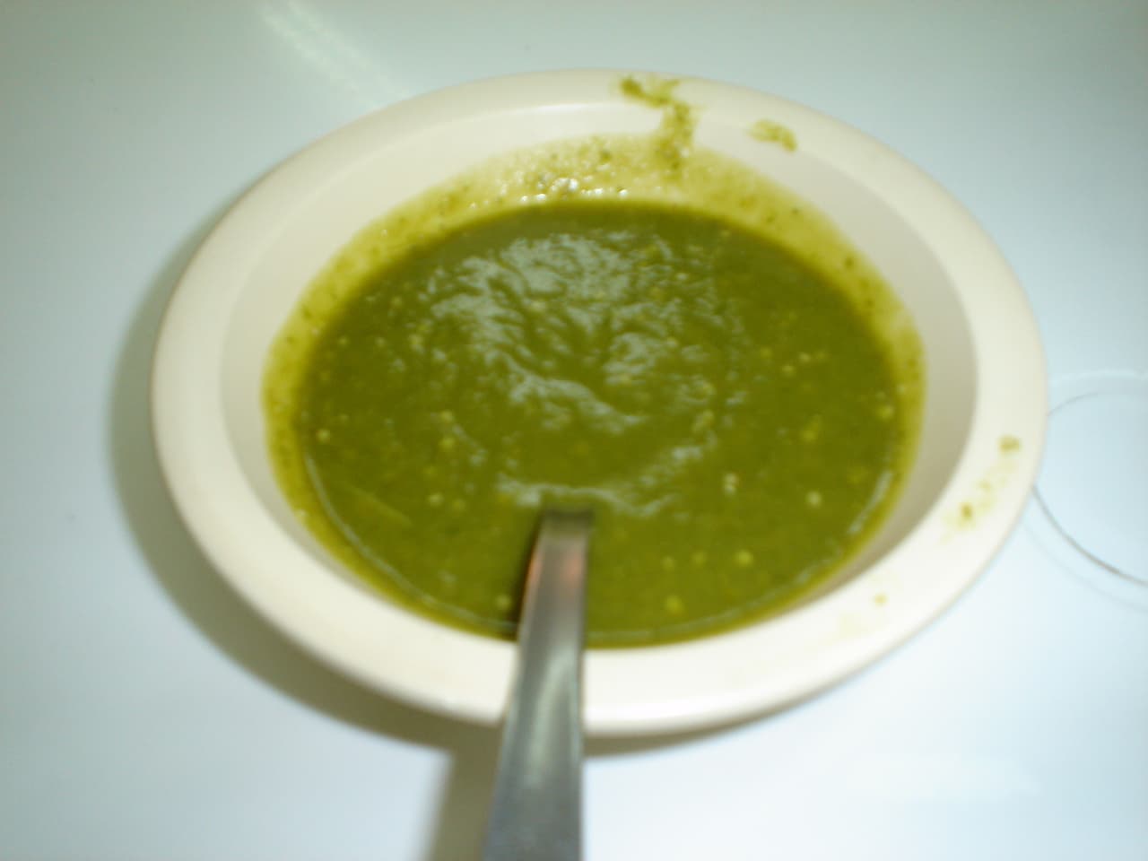 Salsa verde — a mexican main course dish from Mexico — featuring tomatillo-forward, green-chile-based, spicy