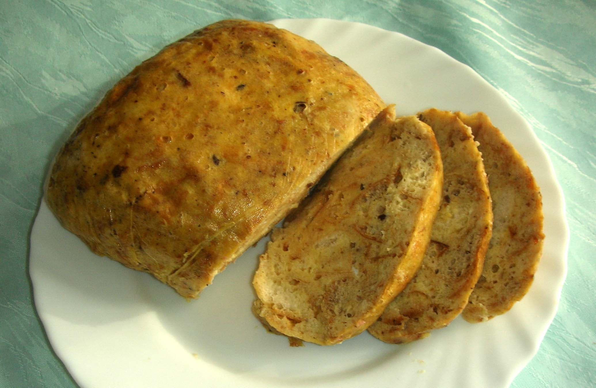 Serviettenknödel — a austrian dessert dish from Austria — featuring bread-based, boiled dumpling, Central European