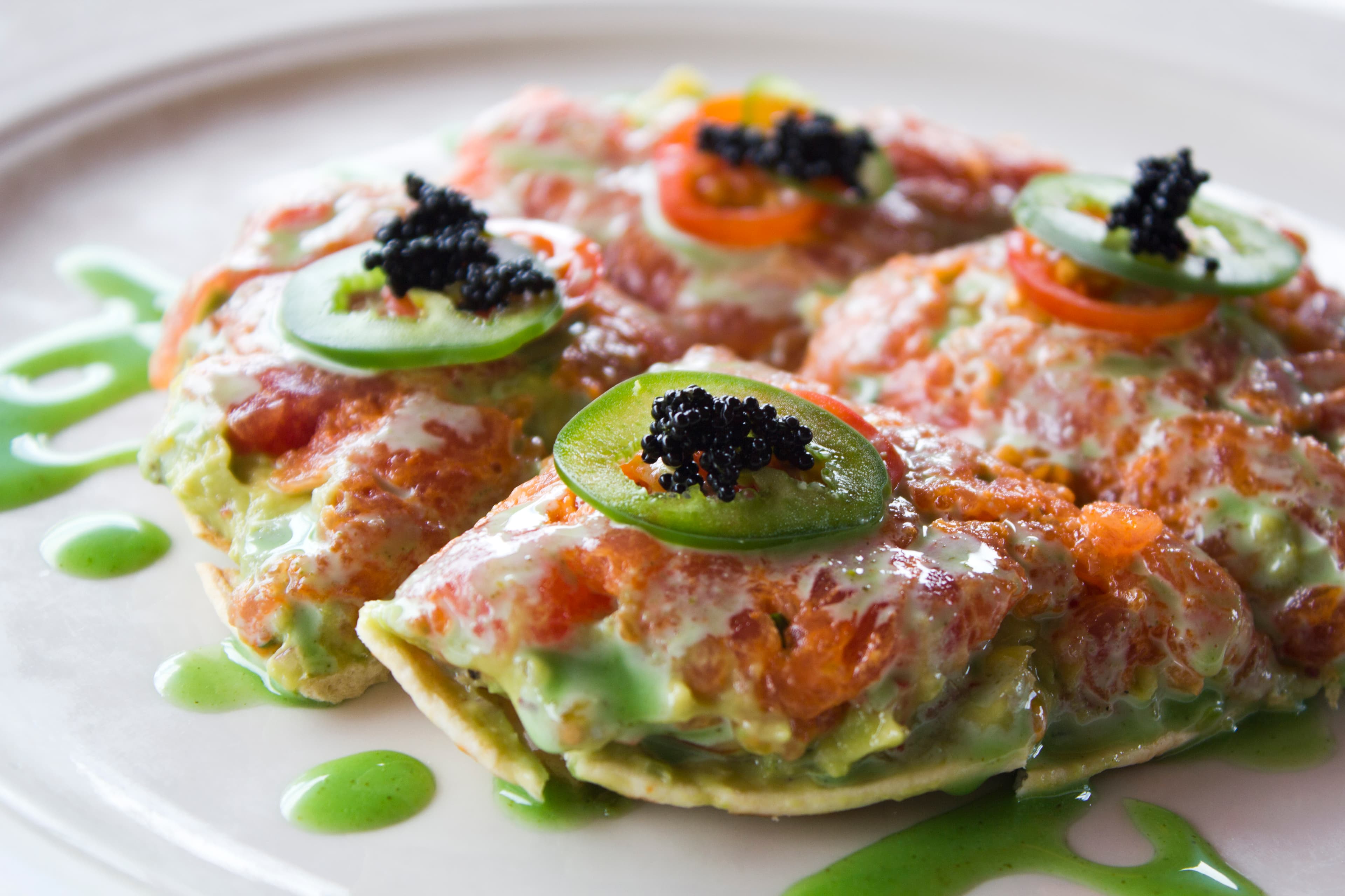 Sushi pizza — a canadian main course dish from Canada — featuring fried rice base, raw fish topping, fusion form