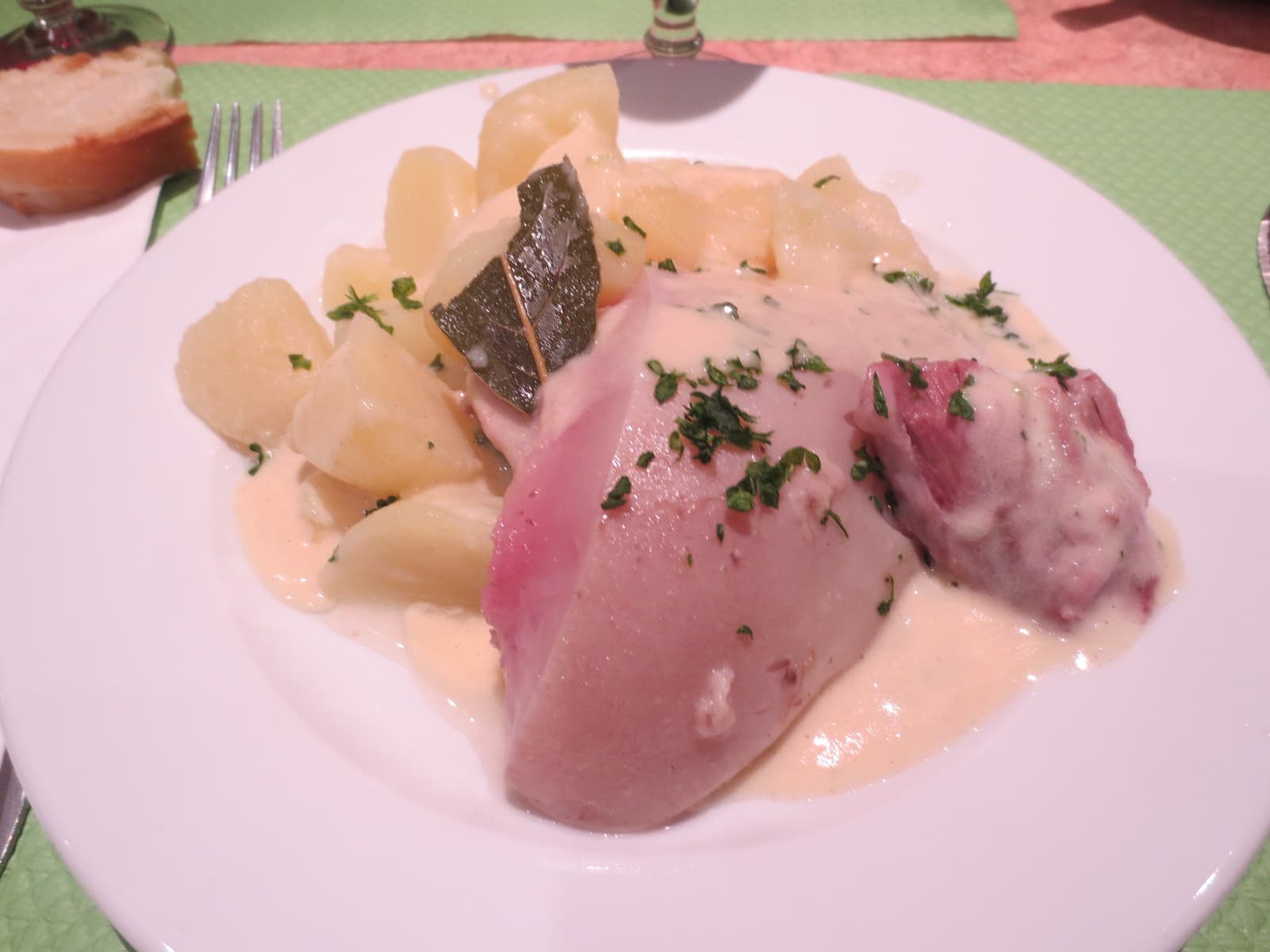 Tête de veau — a dutch main course dish from Netherlands — featuring poached or roasted, boned and rolled, vinaigrette-dressed