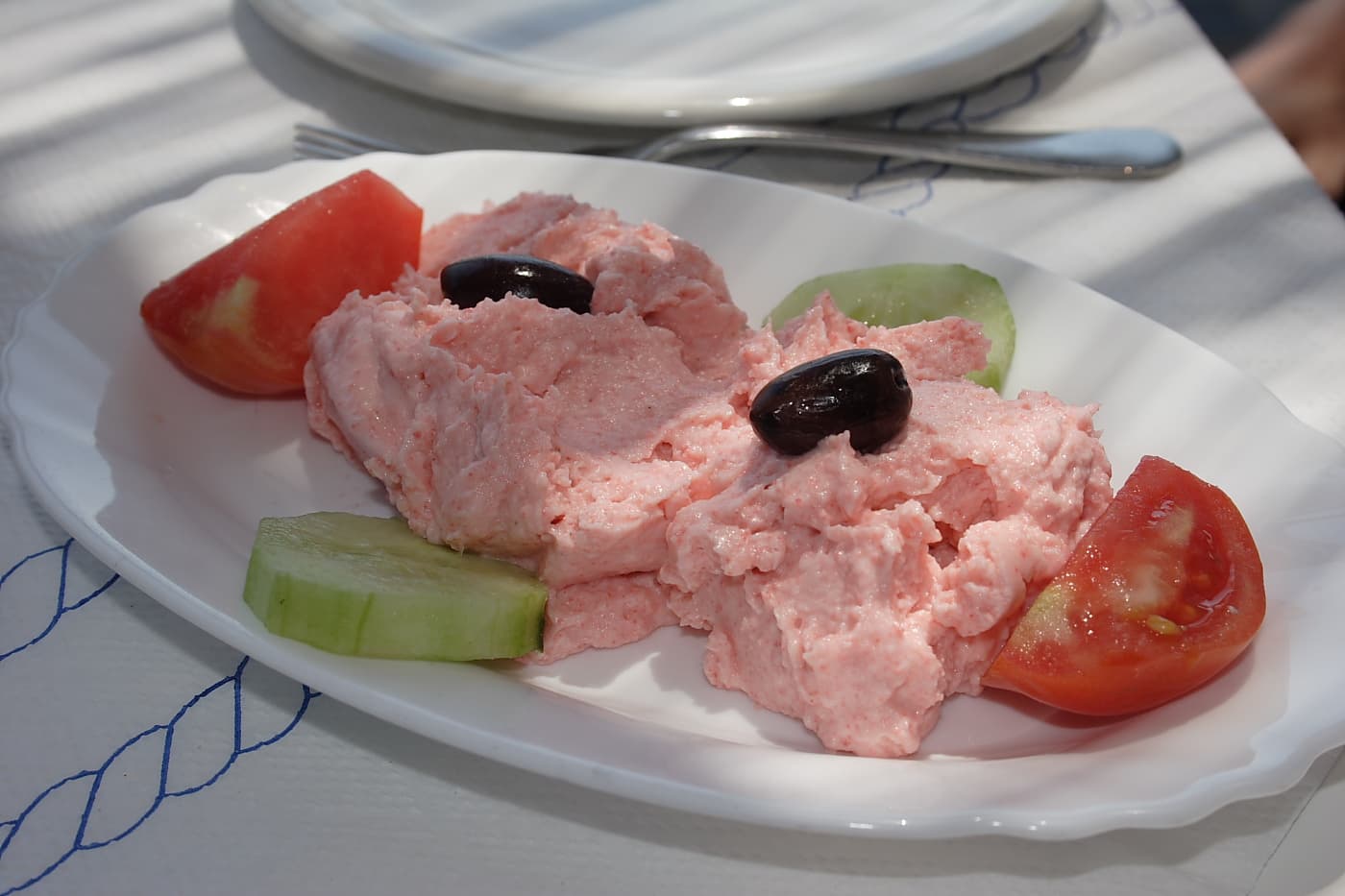 Taramasalata — a turkish main course dish from Turkey — featuring cured roe base, hand-mortared or commercial-smooth, beige to pink