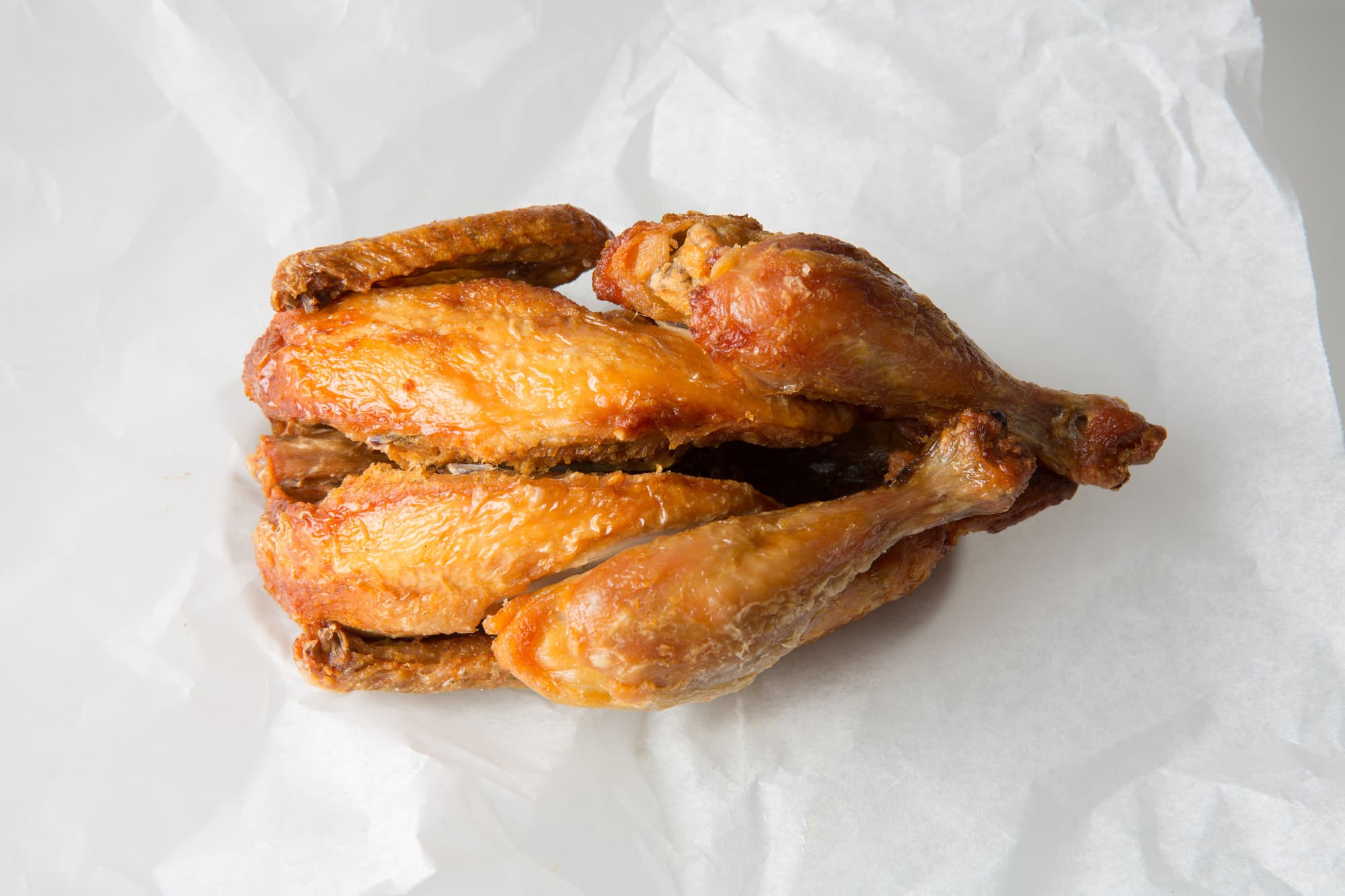 Tongdak — a korean main course dish from South Korea — featuring deep-fried whole bird, 1970s proto-style, retro comfort food