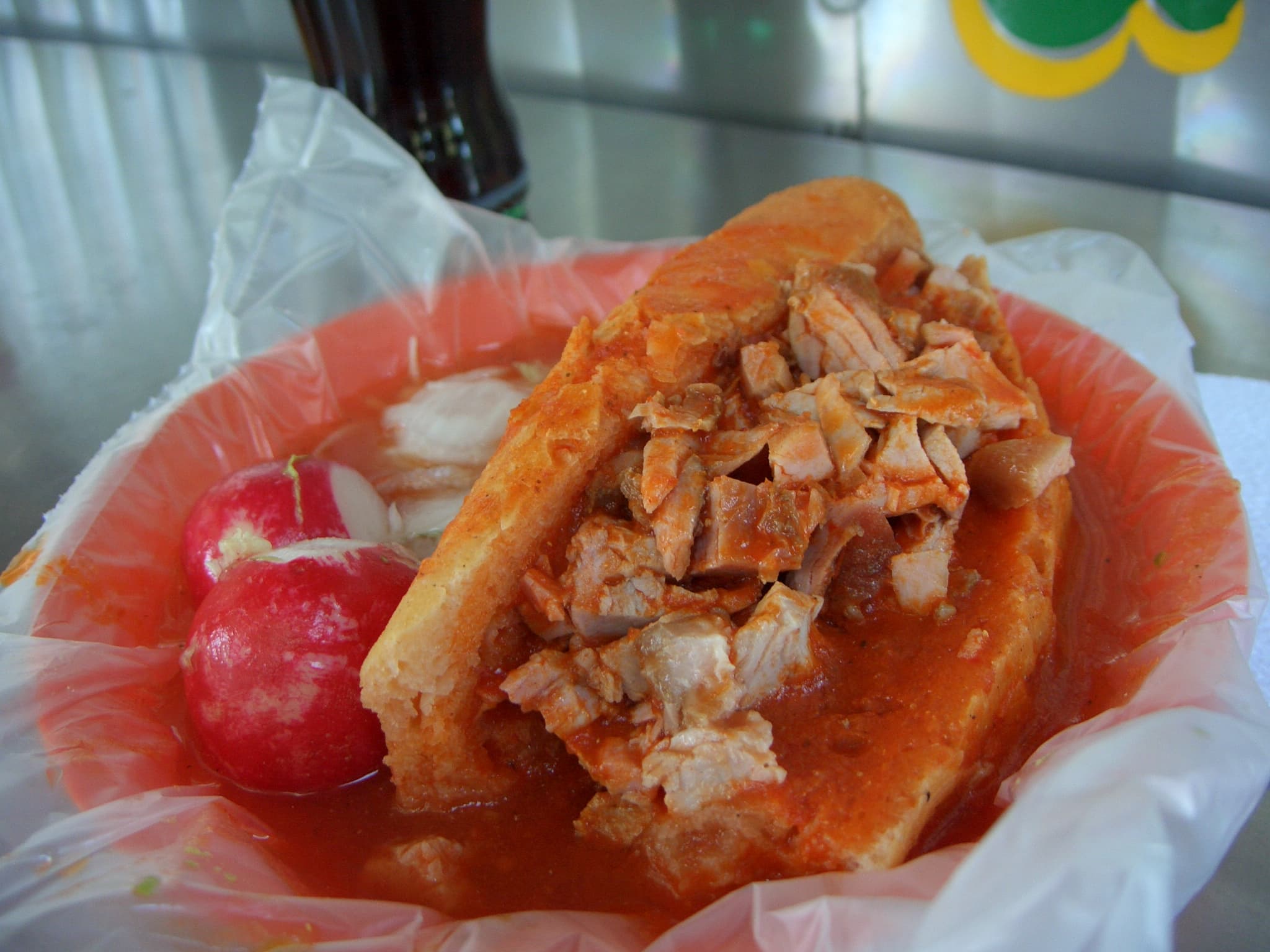 Torta ahogada — a mexican main course dish from Mexico — featuring vinegar-soaked, chile-forward, Guadalajara classic