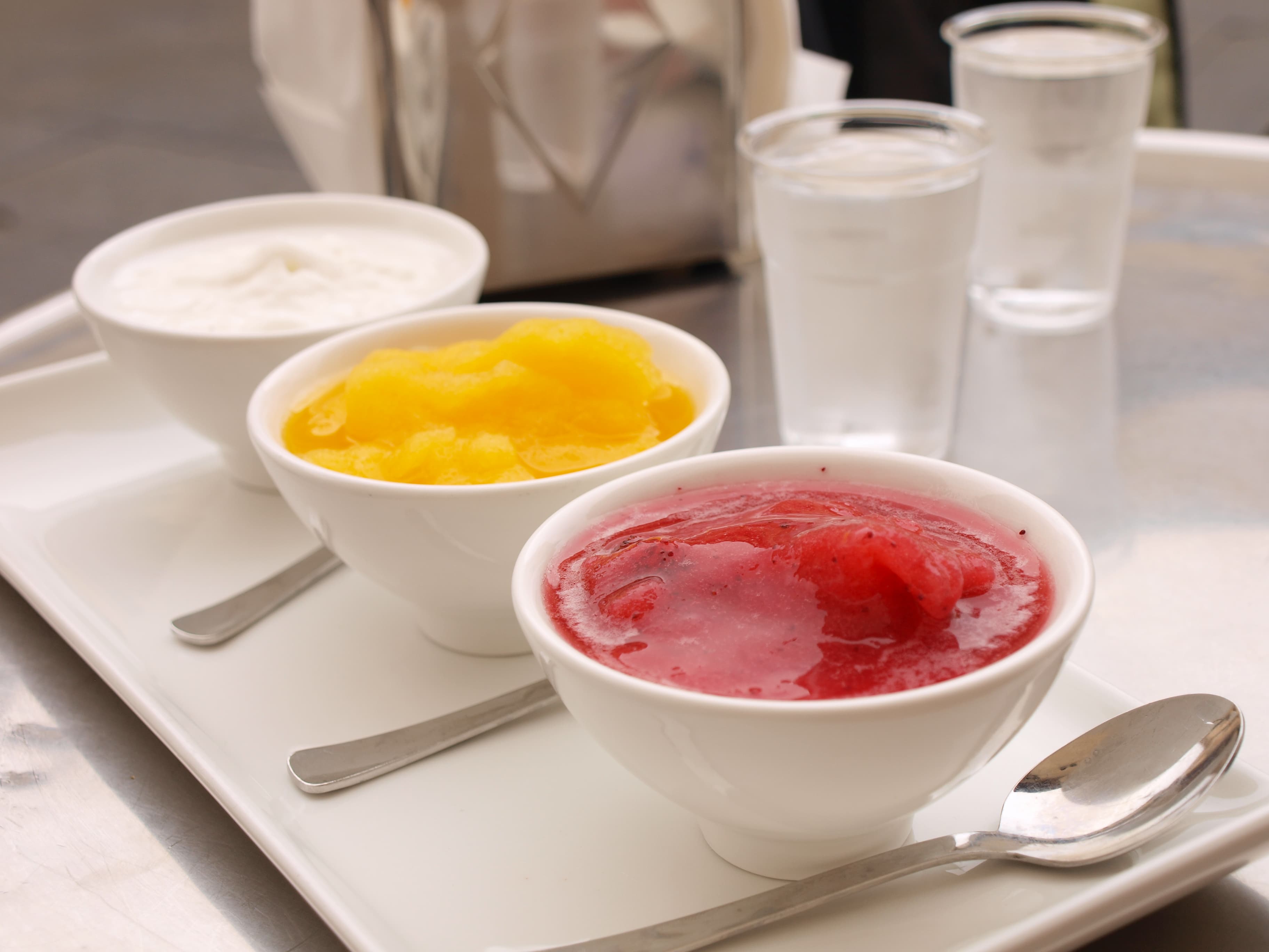 Granita — a sicily cuisine dessert dish from Sicily — featuring semi-frozen, Sicilian, sugar-water base
