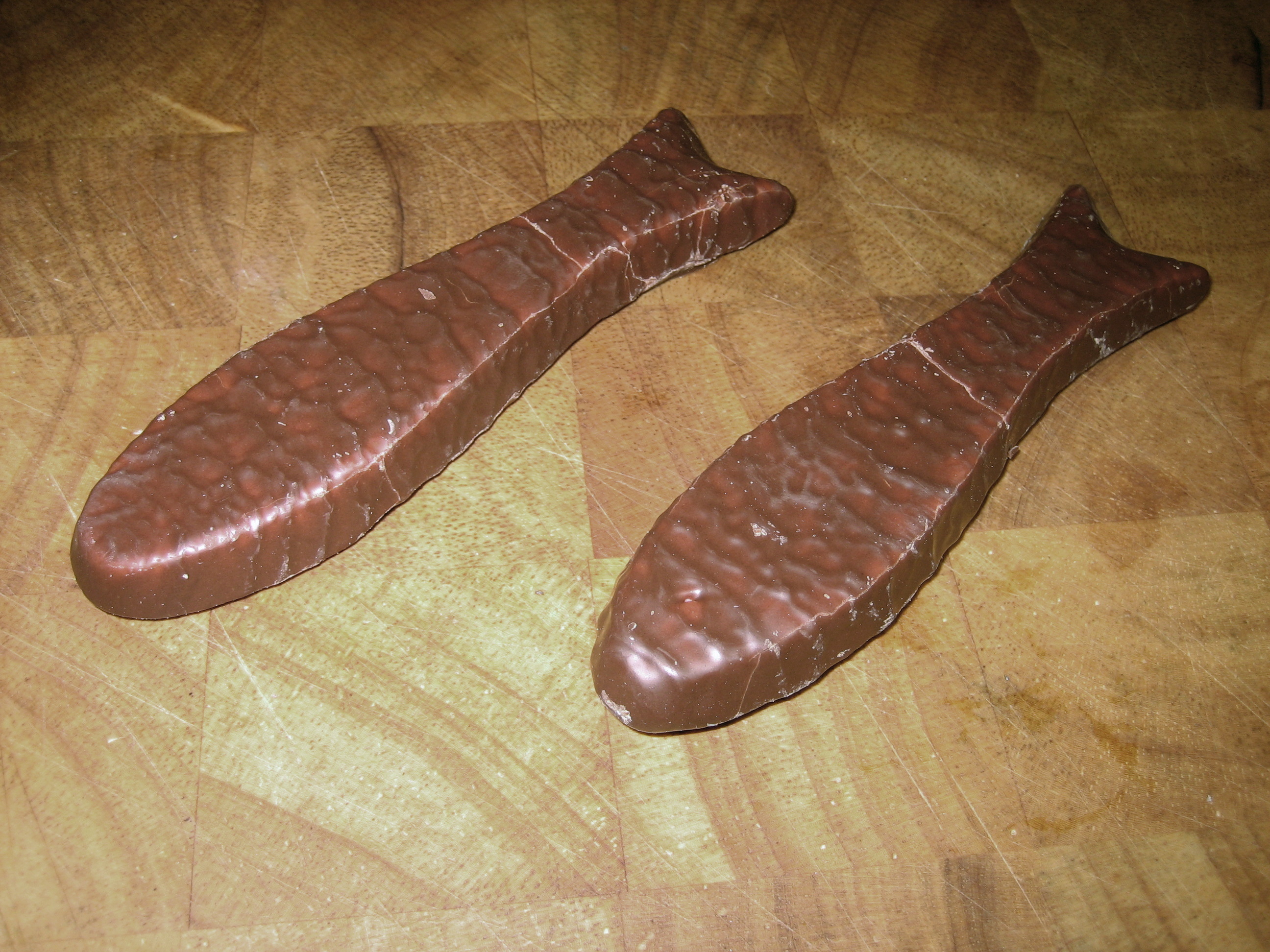 Chocolate fish — a new zealand main course dish from New Zealand — featuring marshmallow core, milk chocolate shell, rippled surface