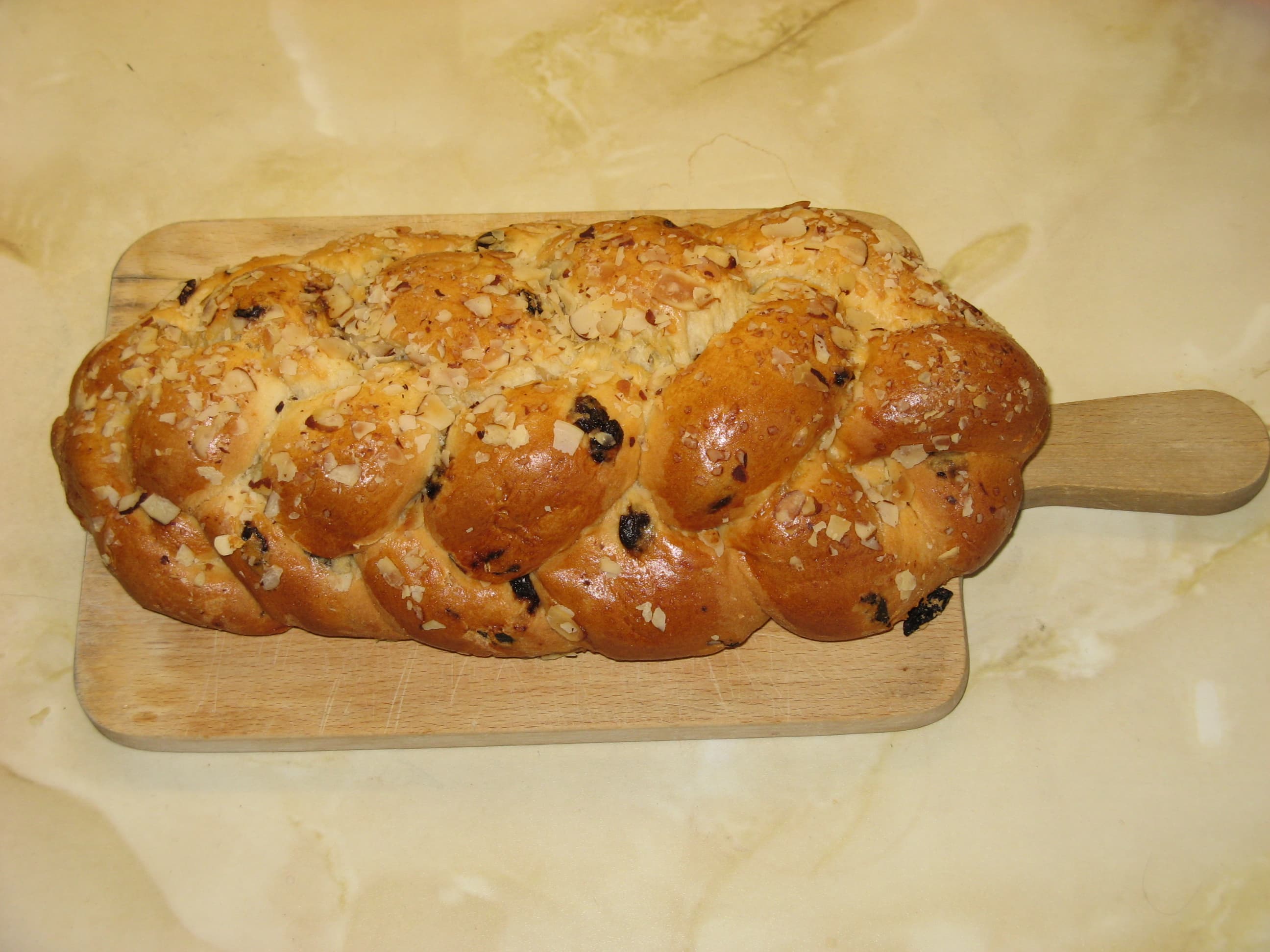 Vánočka — a czech main course dish from Czech Republic — featuring plaited, egg-butter enriched, symbolically layered