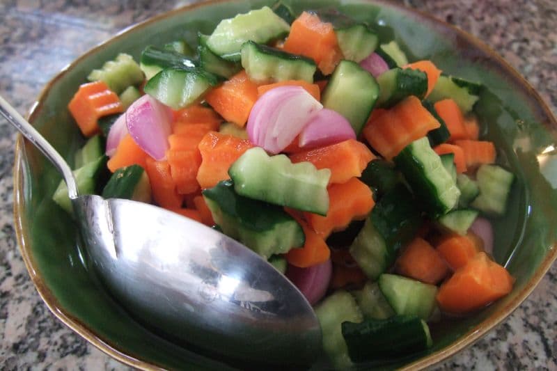 Acar — a indonesian main course dish from Indonesia — featuring brined vegetable pickle, Southeast Asian condiment, bulk-preserved