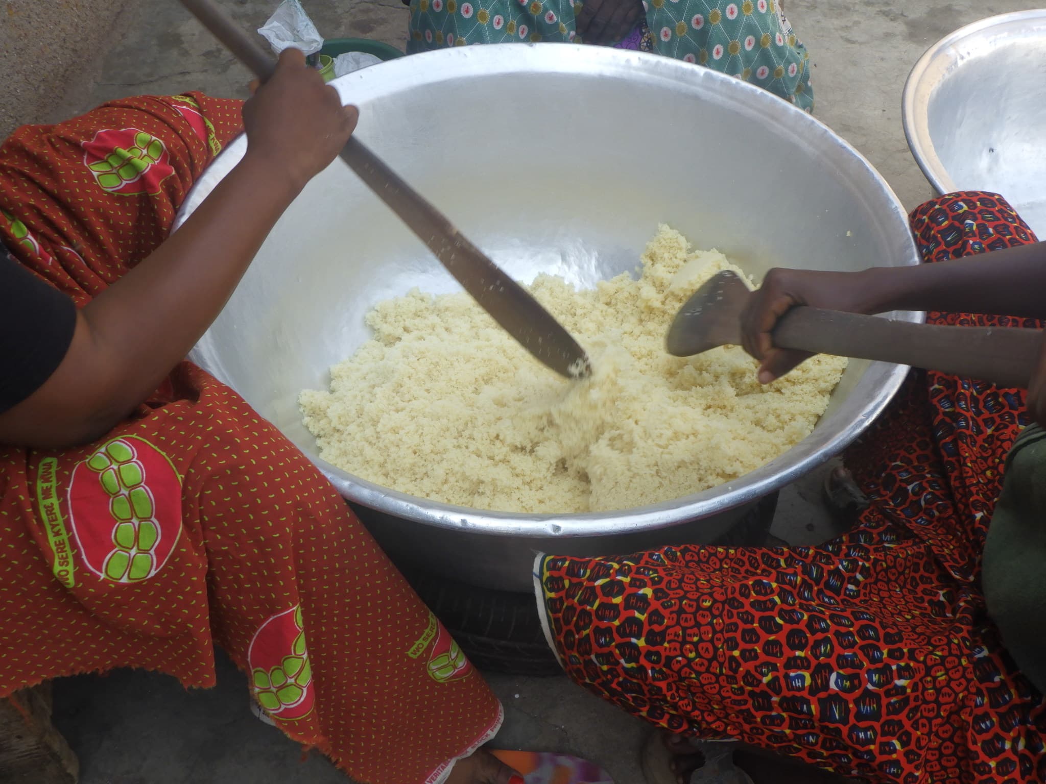 Acheke — a ivory coast cuisine main course dish from Ivory Coast — featuring fermented cassava, deliberately hydrated, grated & granulated