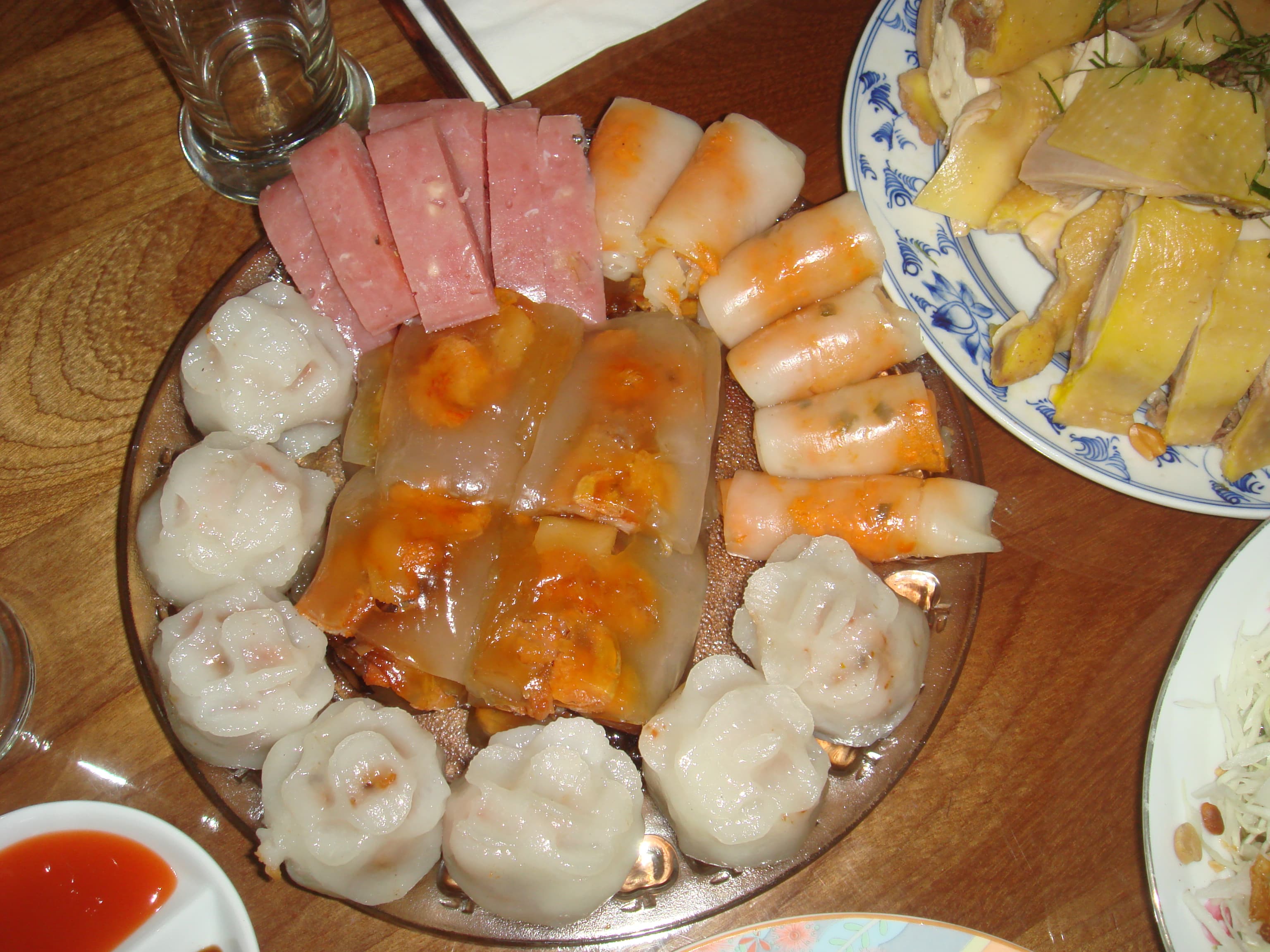 Bánh — a vietnamese main course dish from Vietnam — featuring hand-to-mouth, leaf-wrapped, rice or wheat flour