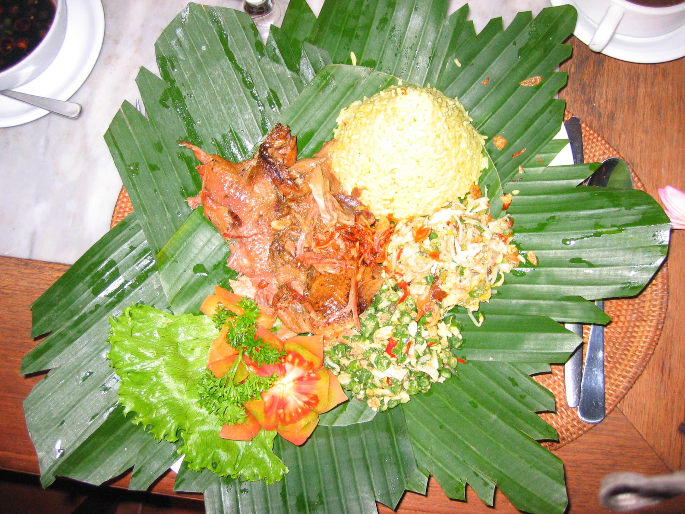 Betutu — a indonesian main course dish from Indonesia — featuring steamed or roasted, heavily spiced, rich bumbu paste