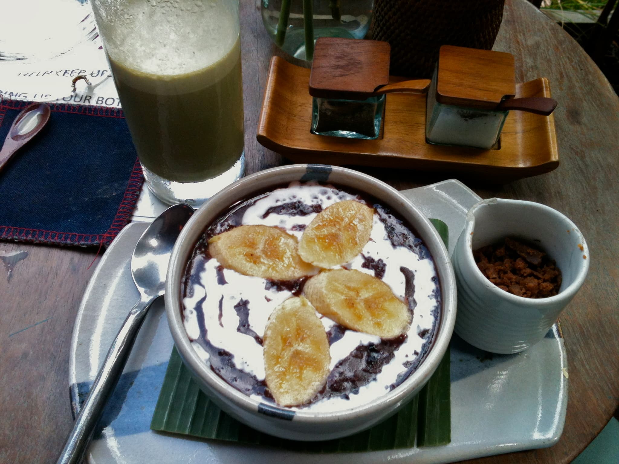 Bubur ketan hitam — a indonesian dessert dish from Indonesia — featuring glutinous rice base, coconut milk enriched, palm sugar sweetened