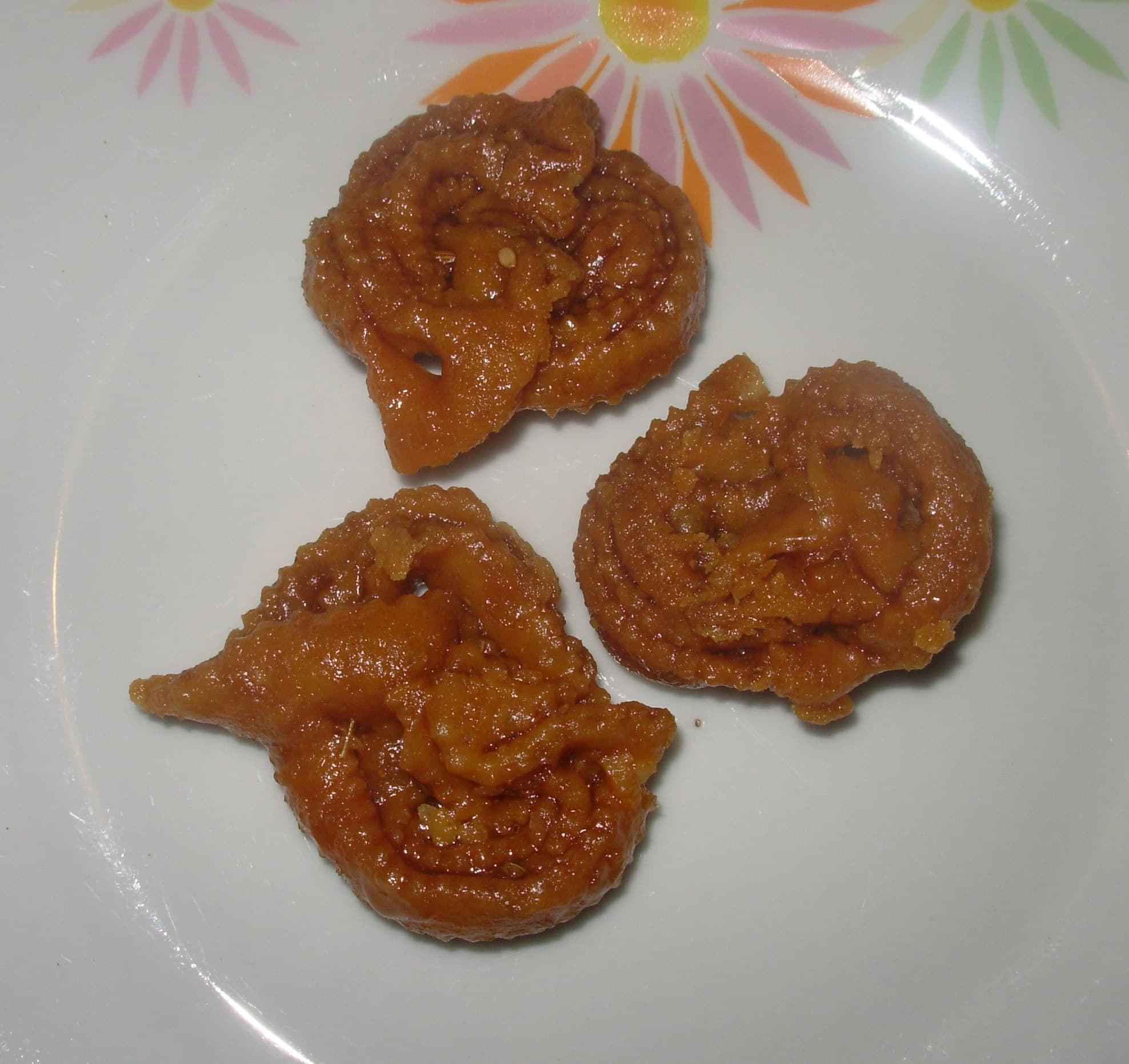 Shebakia — a ottoman empire cuisine main course dish from Ottoman Empire — featuring honey-glazed, rose-shaped, sesame-crusted